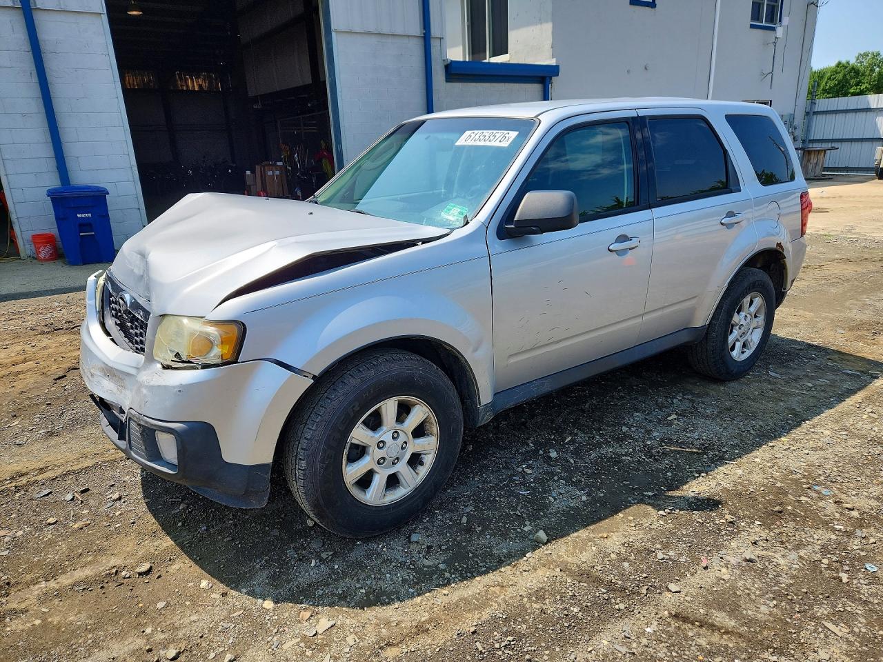 4F2CY9C72BKM01057 · 2011 MAZDA TRIBUTE