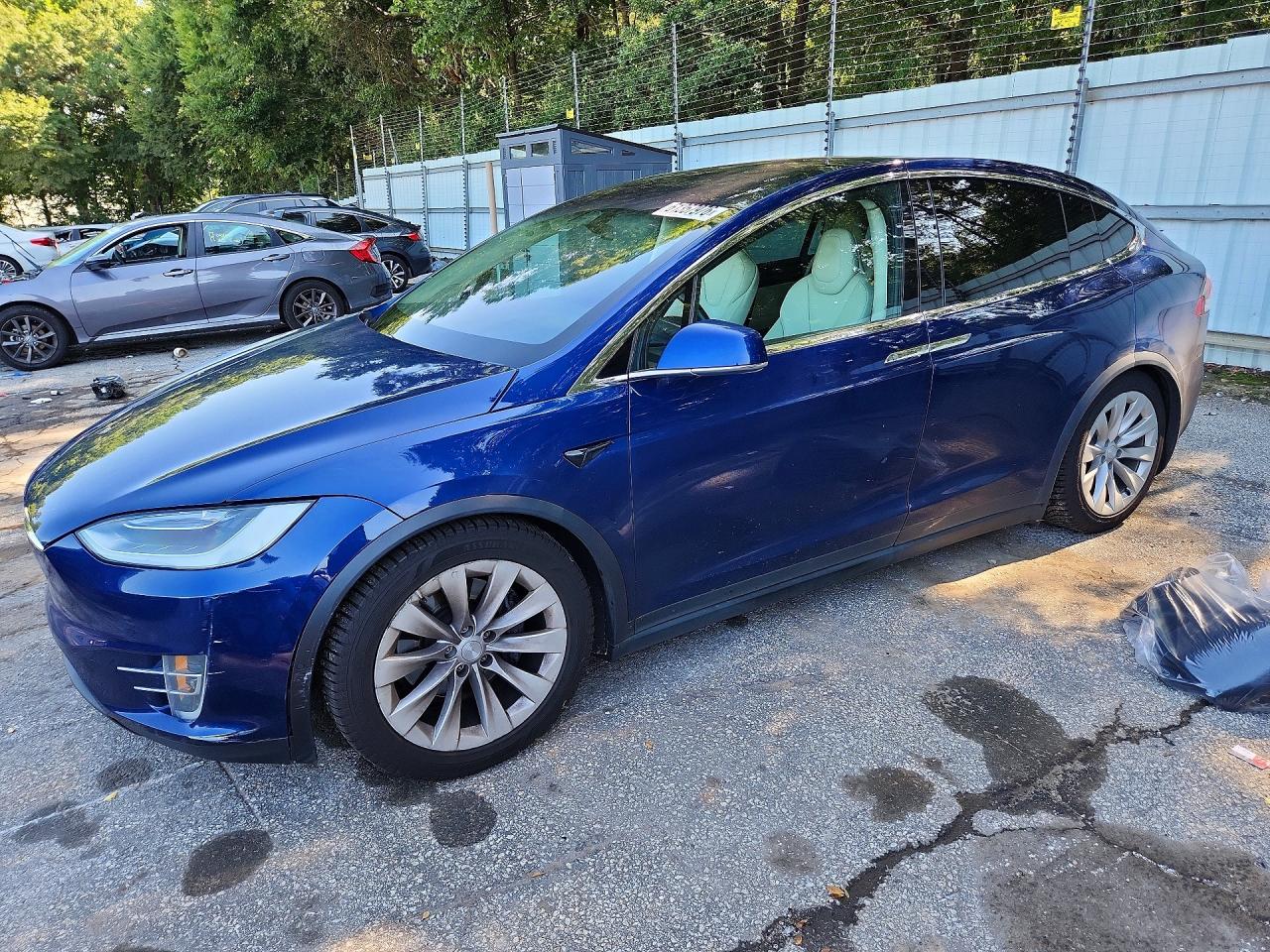 5YJXCBE2XHF077371 · 2017 TESLA MODEL X