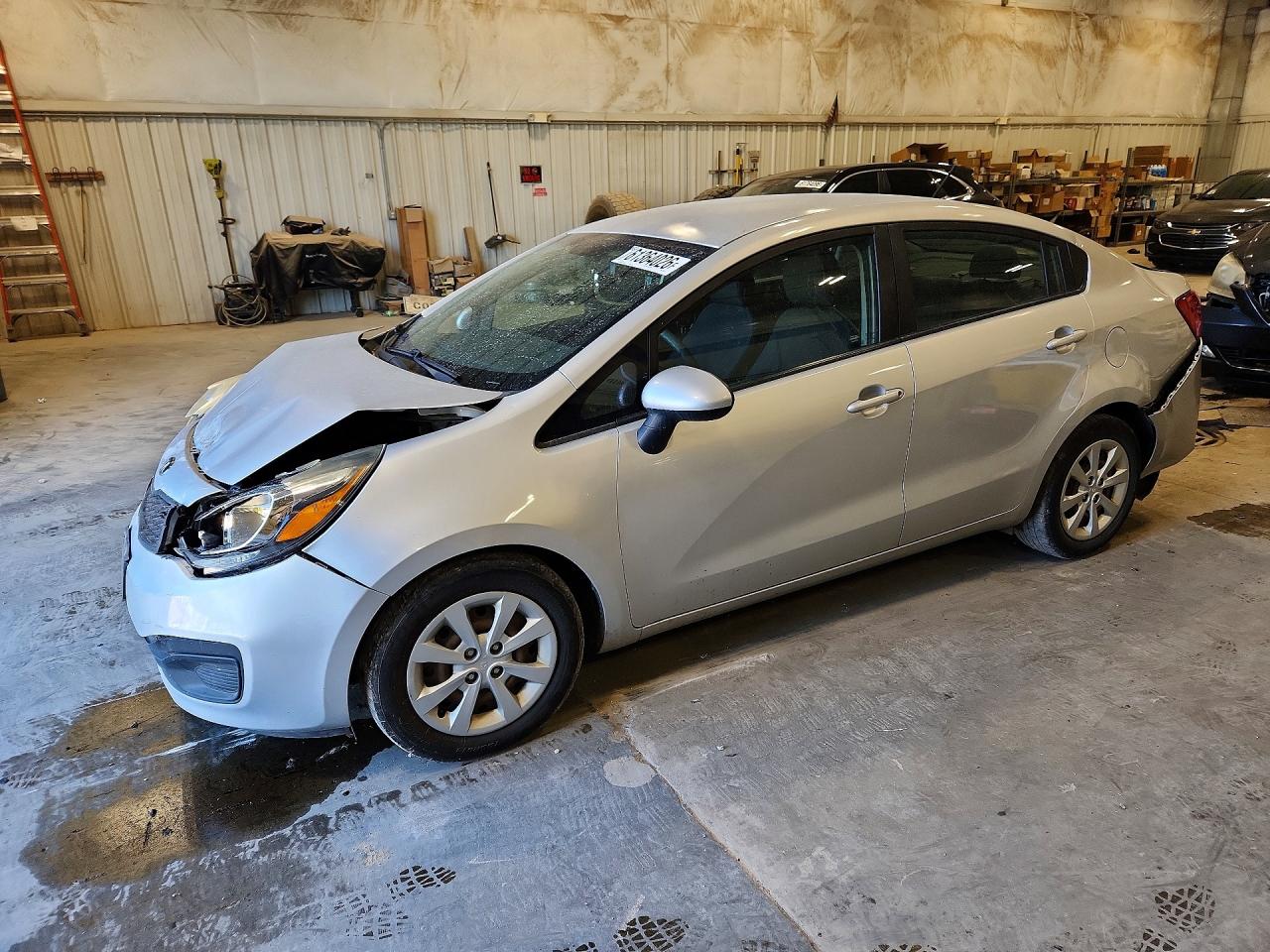KNADM4A34E6349279 · 2014 KIA RIO