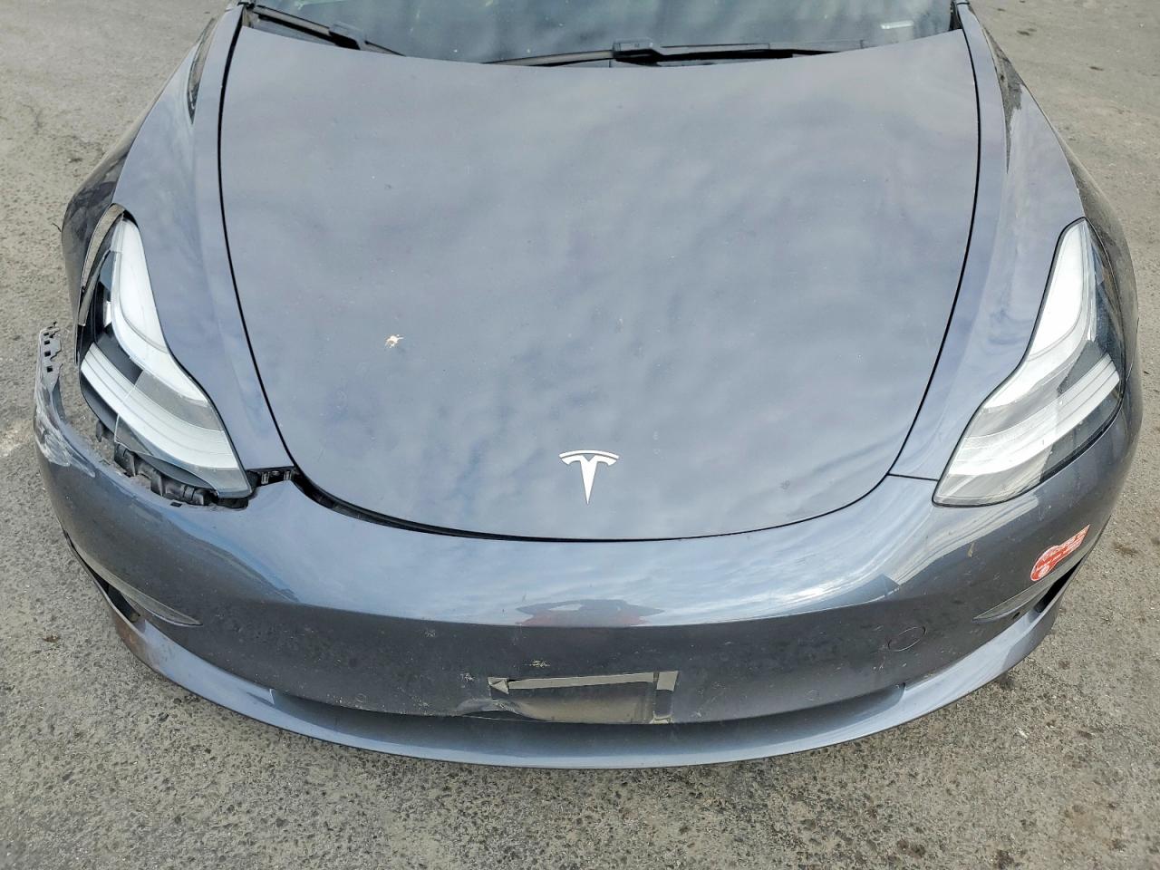 5YJ3E1EA2JF009548 · 2018 TESLA MODEL 3 · 11/12