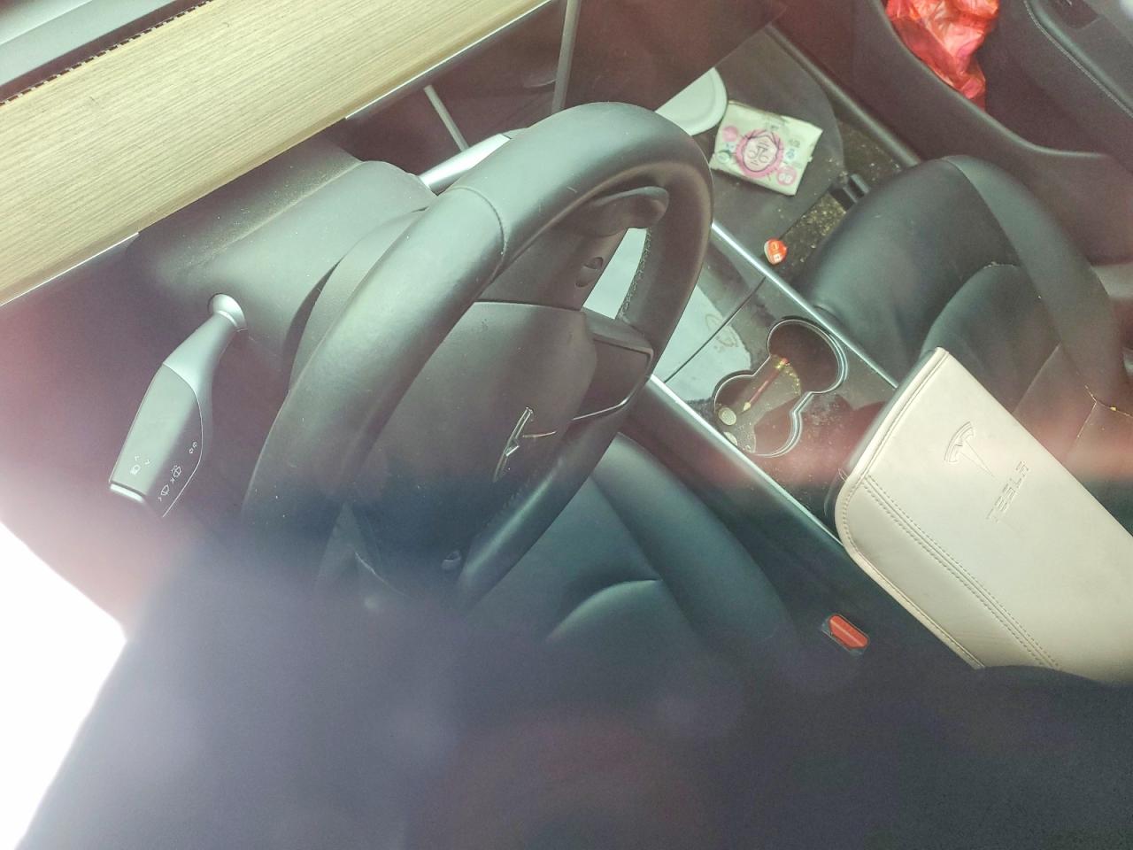 5YJ3E1EA2JF009548 · 2018 TESLA MODEL 3 · 8/12
