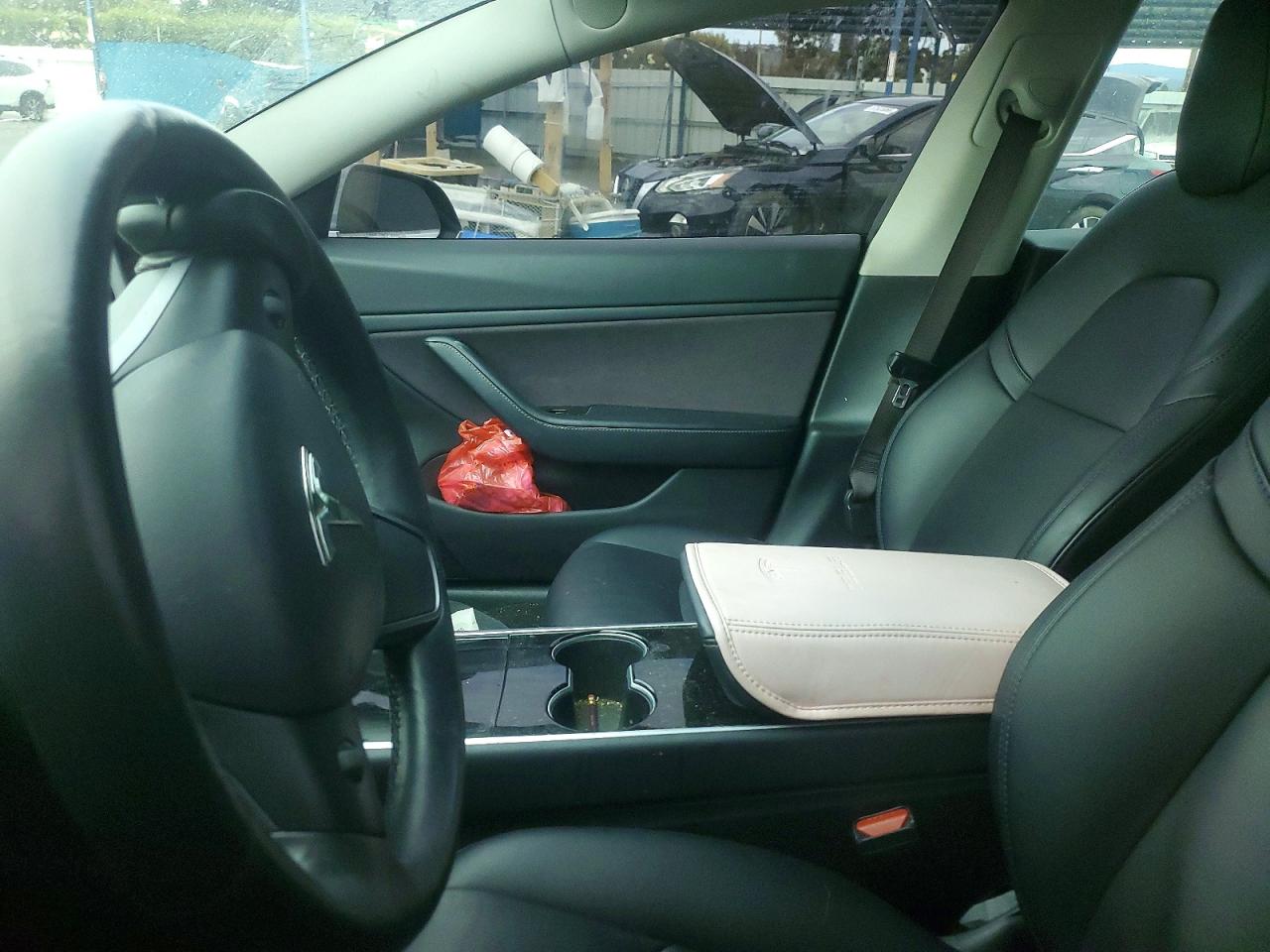 5YJ3E1EA2JF009548 · 2018 TESLA MODEL 3 · 7/12