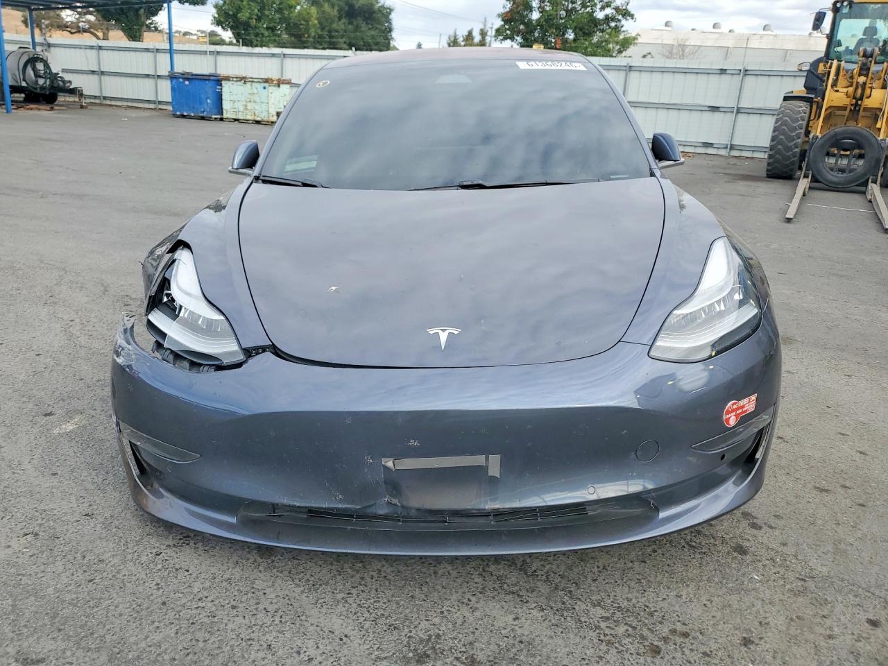 5YJ3E1EA2JF009548 · 2018 TESLA MODEL 3 · 5/12