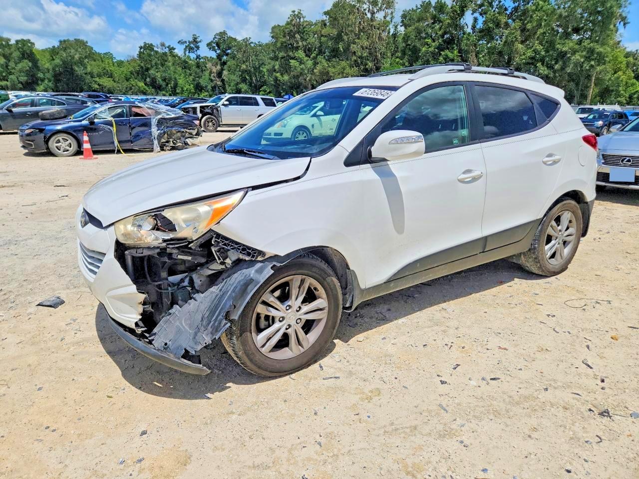 KM8JU3AC0DU784354 · 2013 HYUNDAI TUCSON