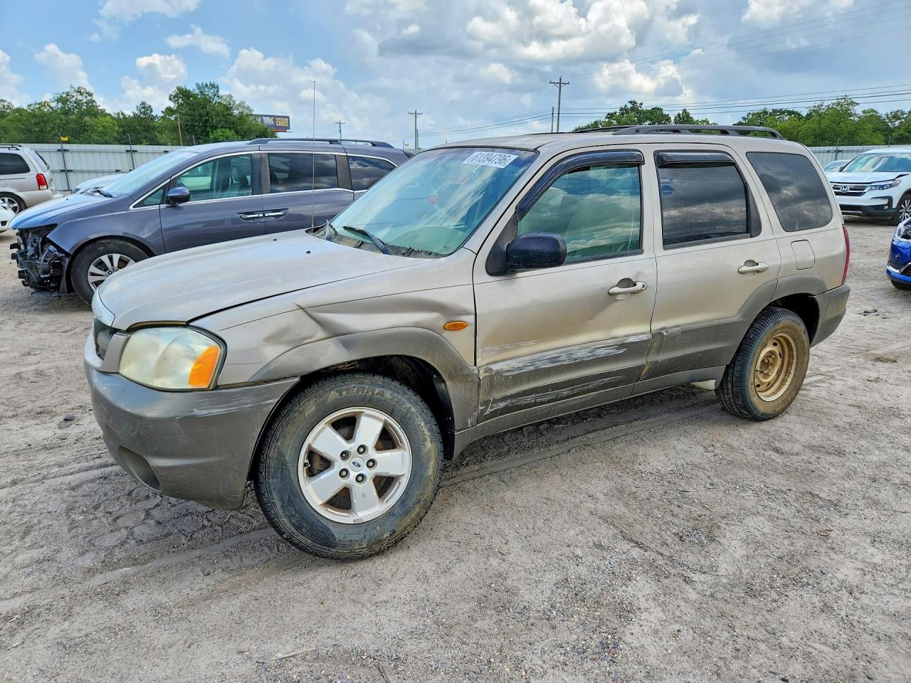 4F2YU091X1KM60985 · 2001 MAZDA TRIBUTE