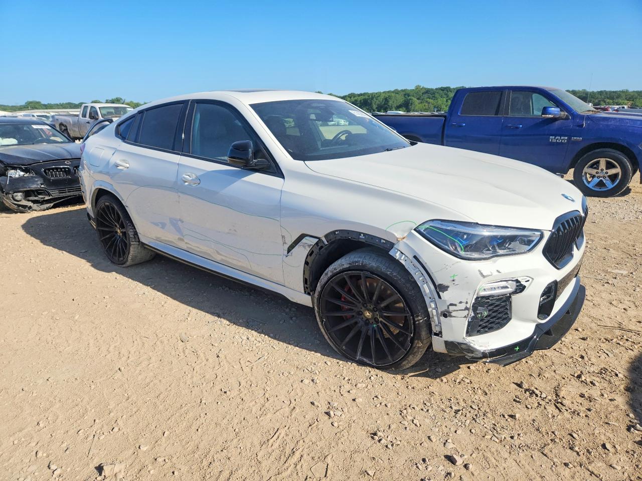 5UXCY8C03M9G97120 · 2021 BMW X6 · 4/12