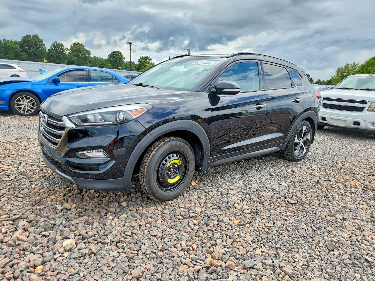 KM8J3CA25GU066197 · 2016 HYUNDAI TUCSON