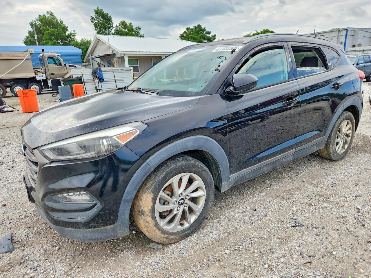 KM8J3CA41GU145920 · 2016 HYUNDAI TUCSON