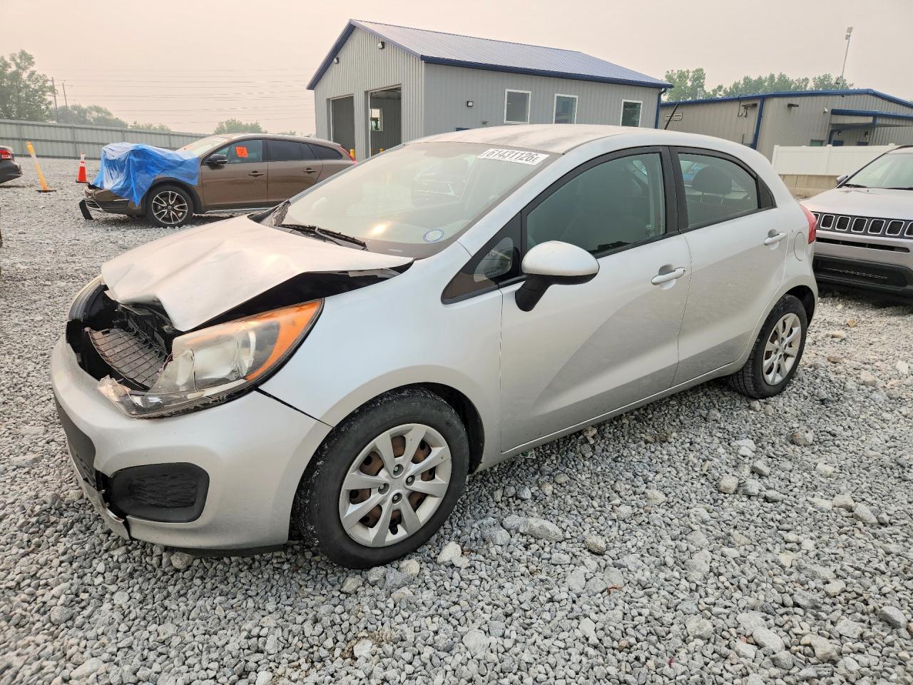 KNADM5A3XE6377321 · 2014 KIA RIO