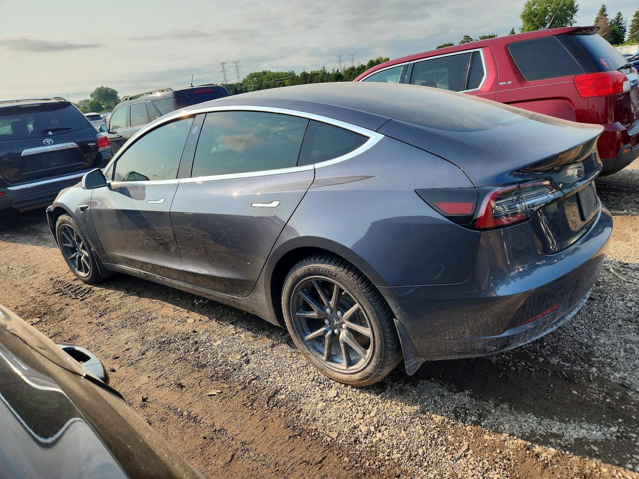 5YJ3E1EA0KF400411 · 2019 TESLA MODEL 3 · 2/12