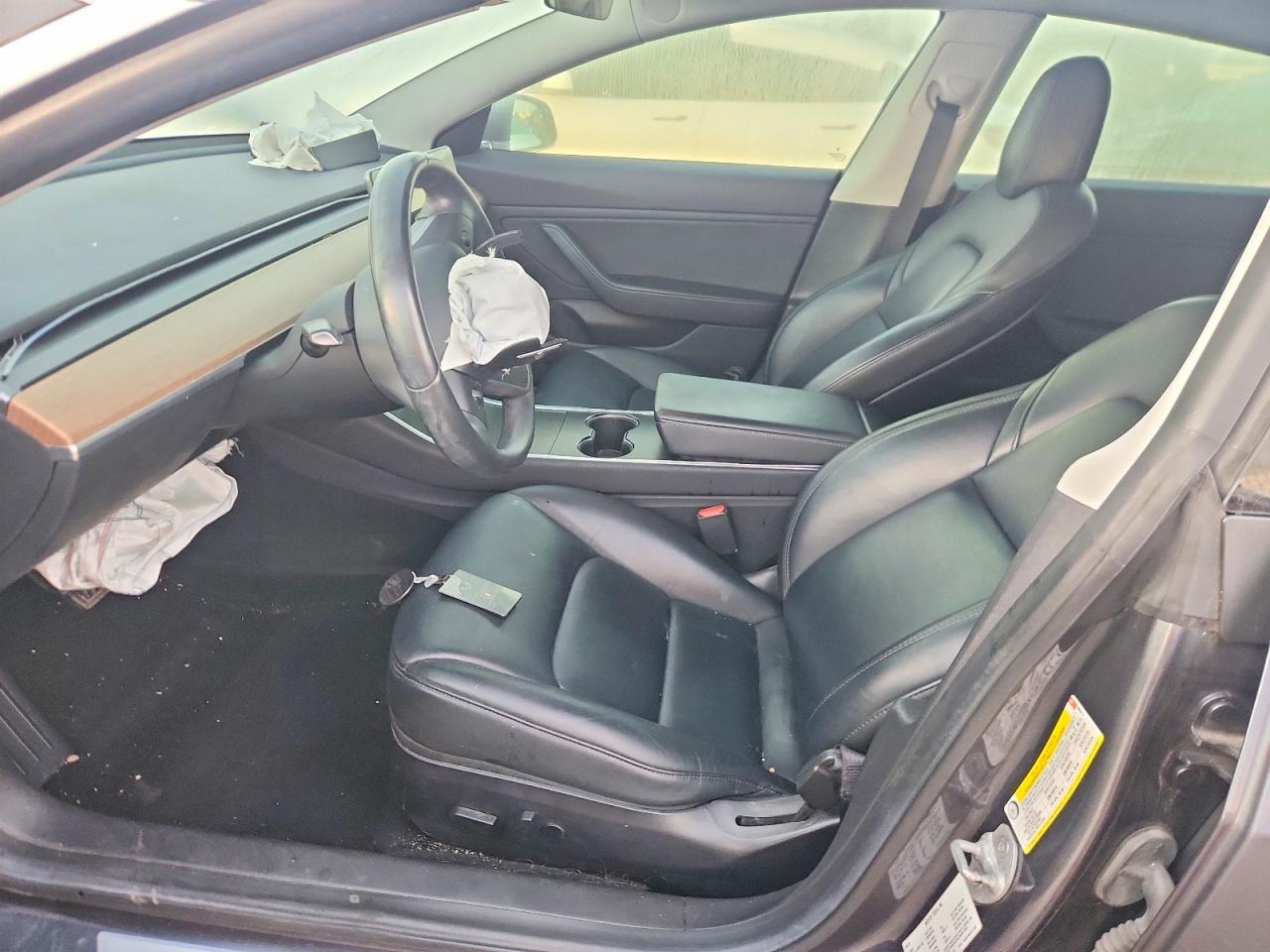 5YJ3E1EA0KF400411 · 2019 TESLA MODEL 3 · 7/12
