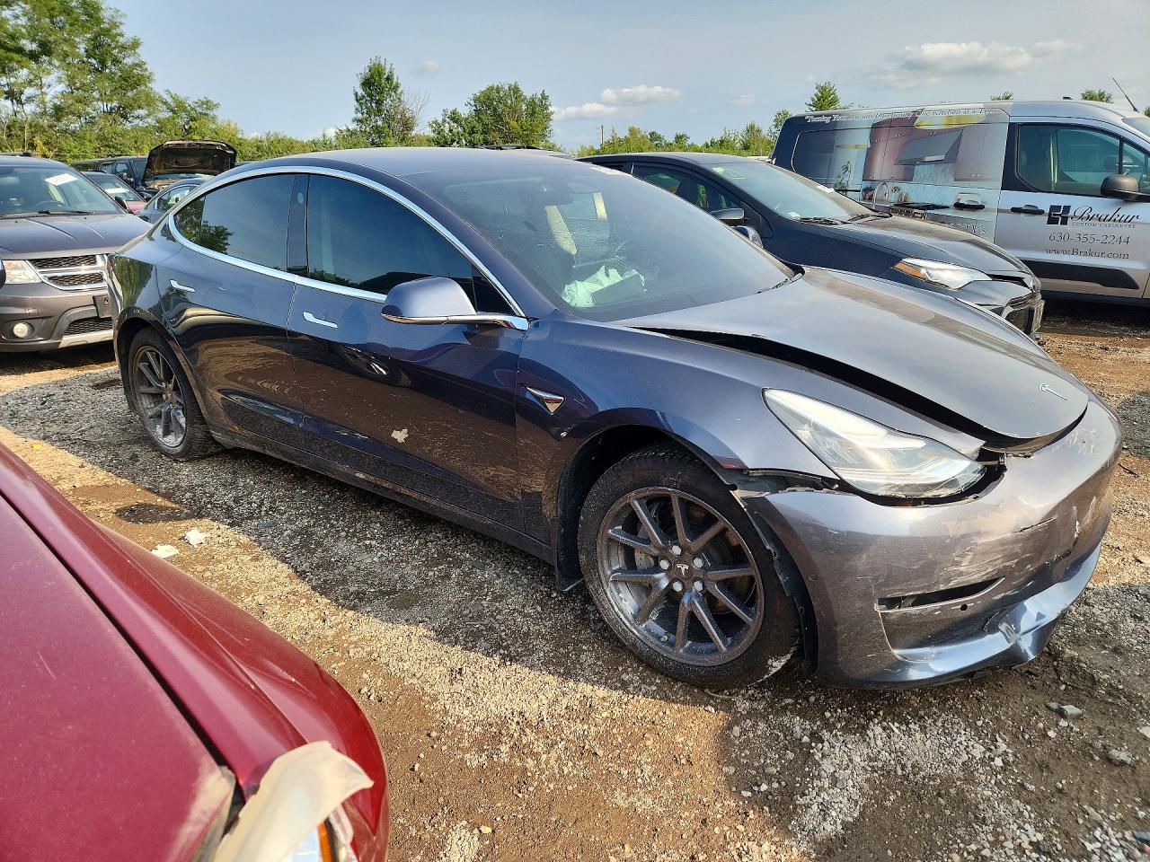 5YJ3E1EA0KF400411 · 2019 TESLA MODEL 3 · 4/12