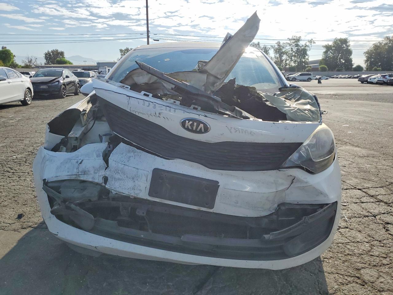 KNADM4A32D6291493 · 2013 KIA RIO · 5/12