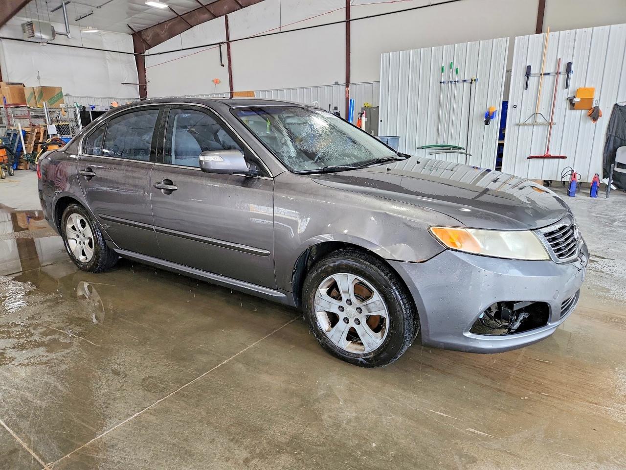 KNAGE228595293969 · 2009 KIA OPTIMA · 4/12
