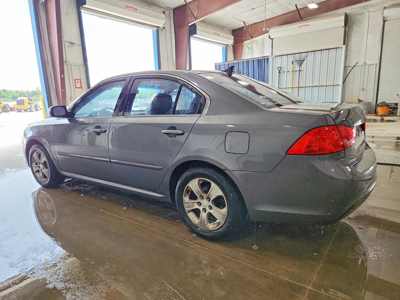KNAGE228595293969 · 2009 KIA OPTIMA · 2/12