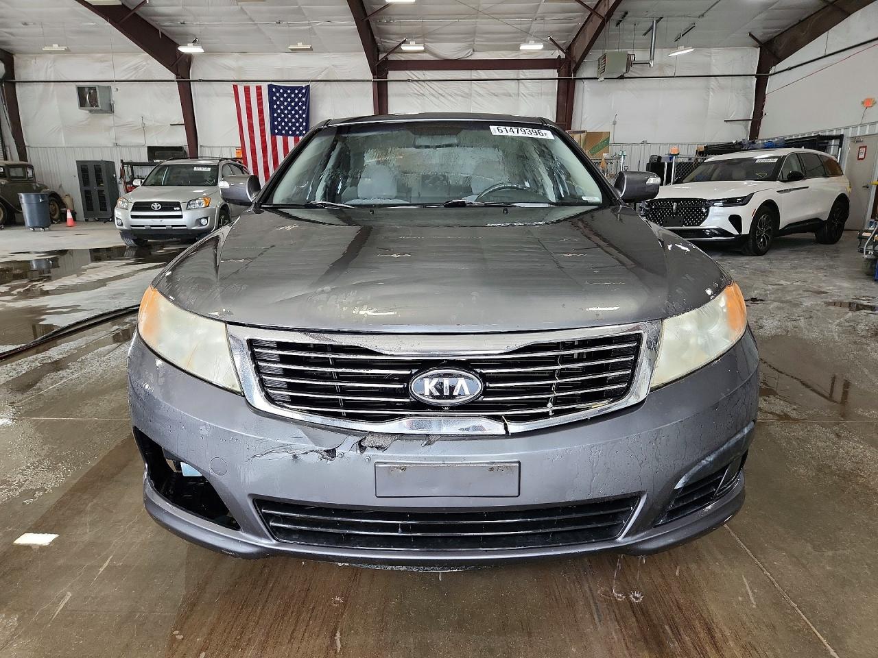 KNAGE228595293969 · 2009 KIA OPTIMA · 5/12