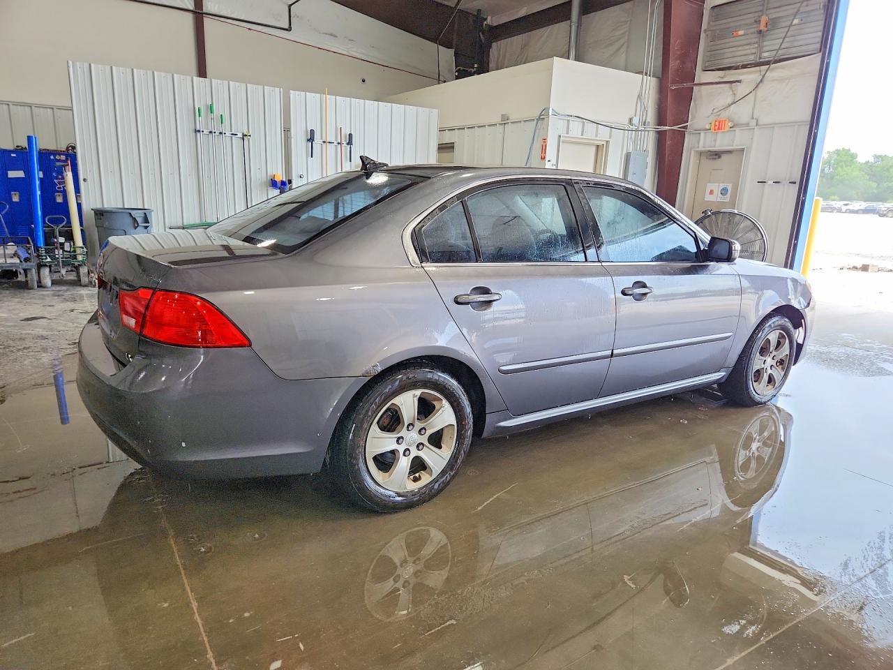 KNAGE228595293969 · 2009 KIA OPTIMA · 3/12