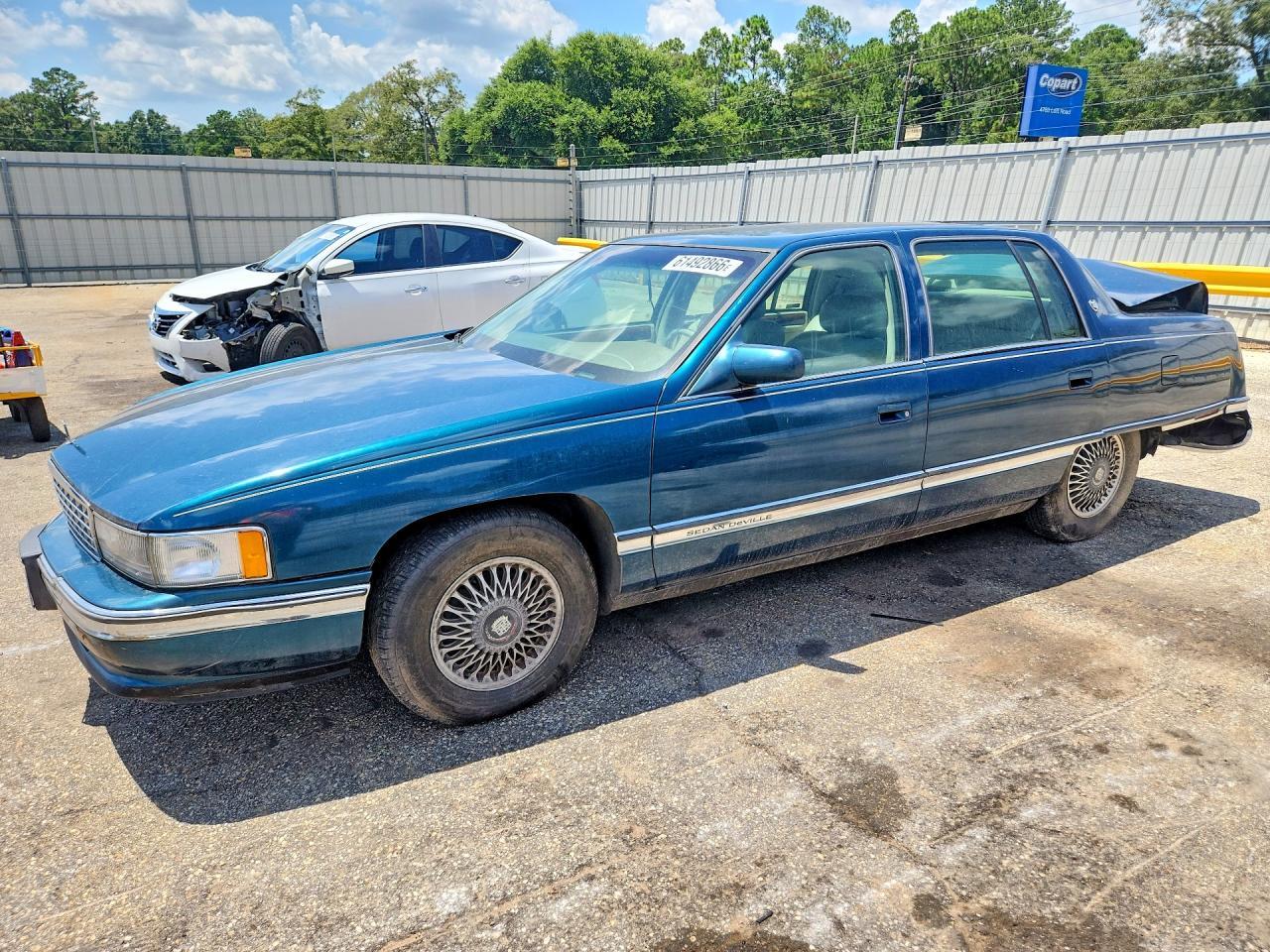 1G6KD52B1SU279384 · 1995 CADILLAC DEVILLE