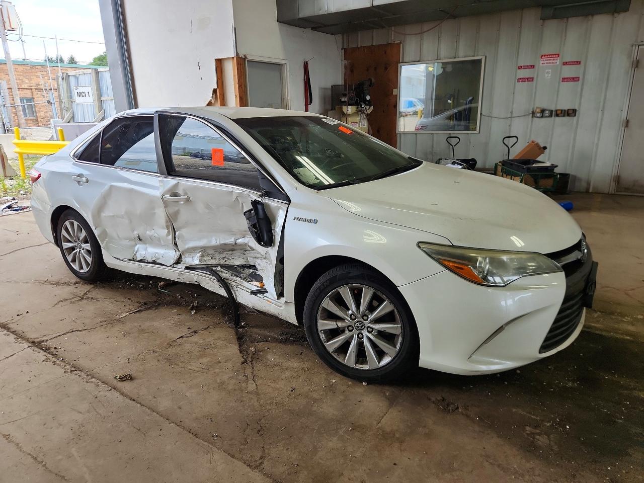 4T1BD1FK5FU150257 · 2015 TOYOTA CAMRY HYBRID · 4/12