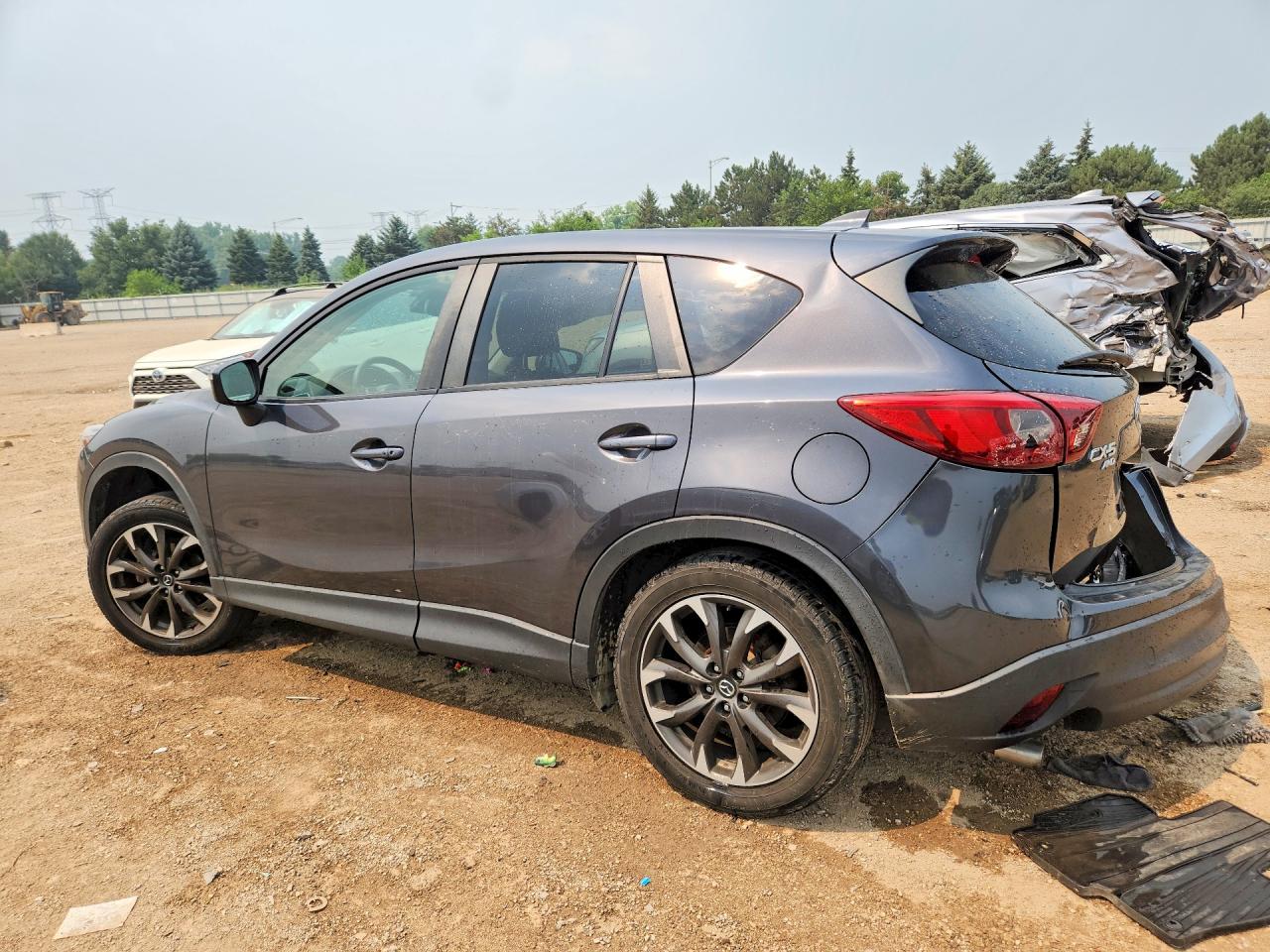 JM3KE4DY7G0693426 · 2016 MAZDA CX-5 · 2/12