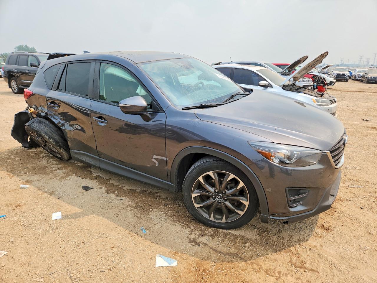 JM3KE4DY7G0693426 · 2016 MAZDA CX-5 · 4/12