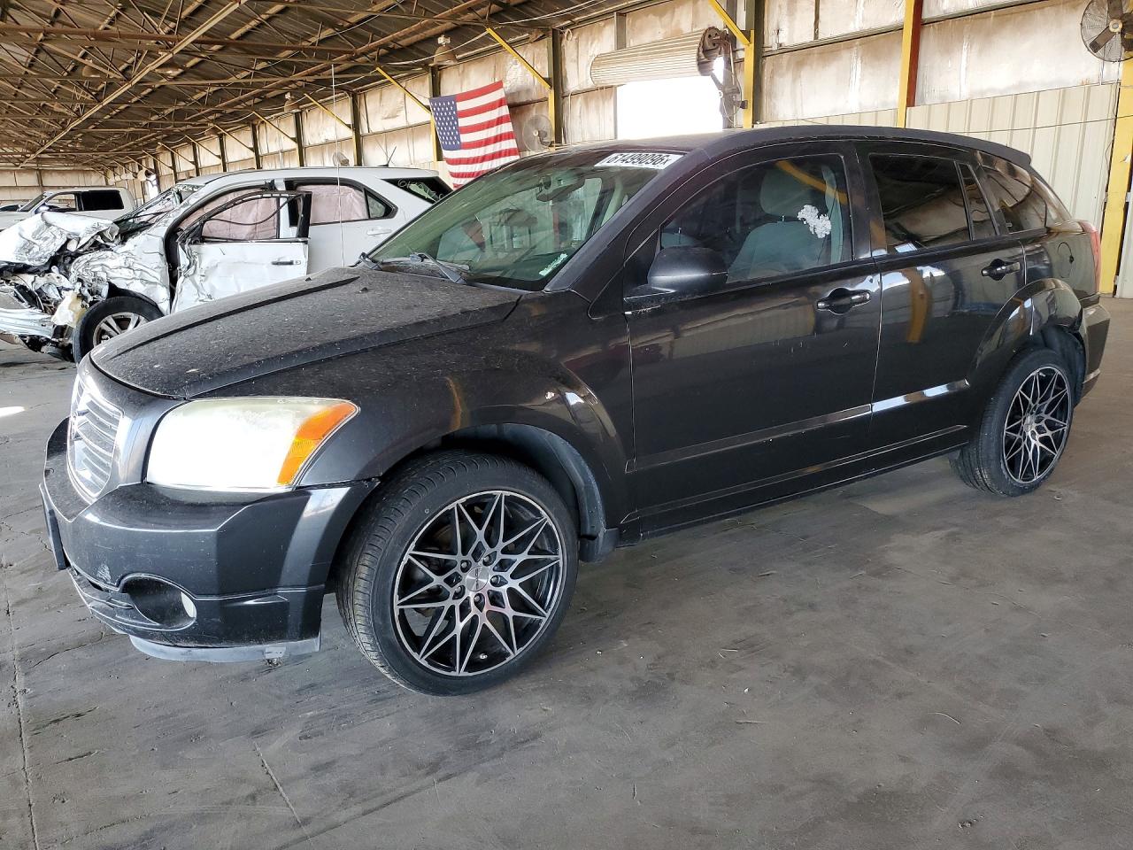 1B3CB3HA6BD110859 · 2011 DODGE CALIBER