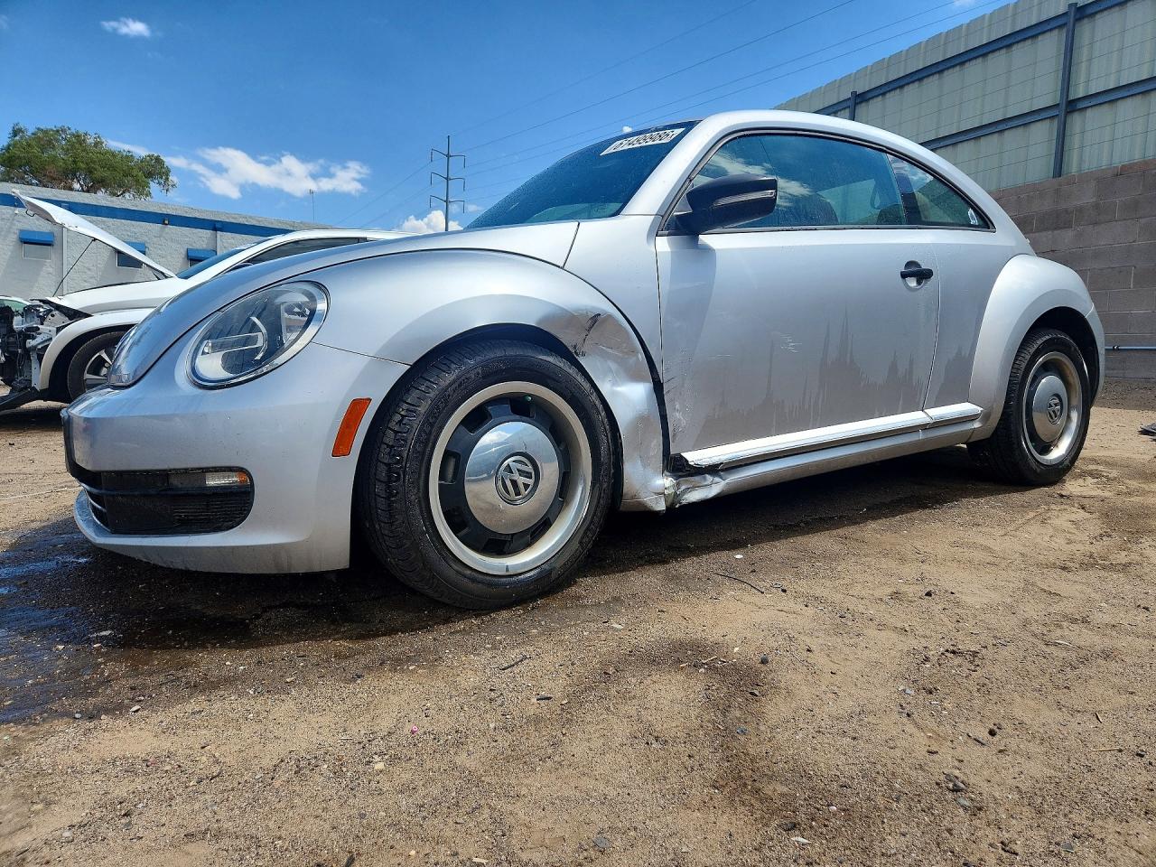 3VWF17AT2FM603611 · 2015 VOLKSWAGEN BEETLE