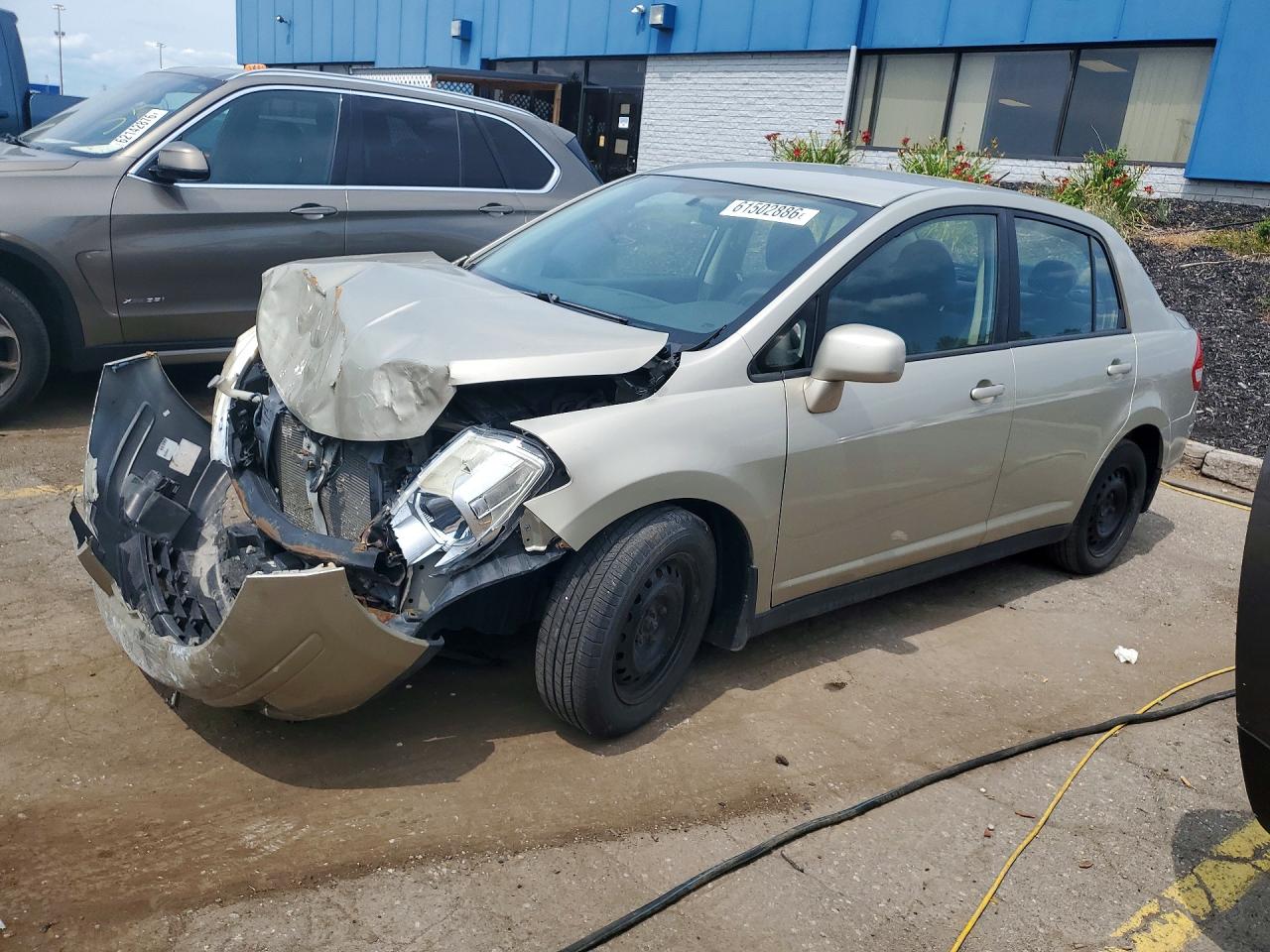 3N1BC11E79L459321 · 2009 NISSAN VERSA