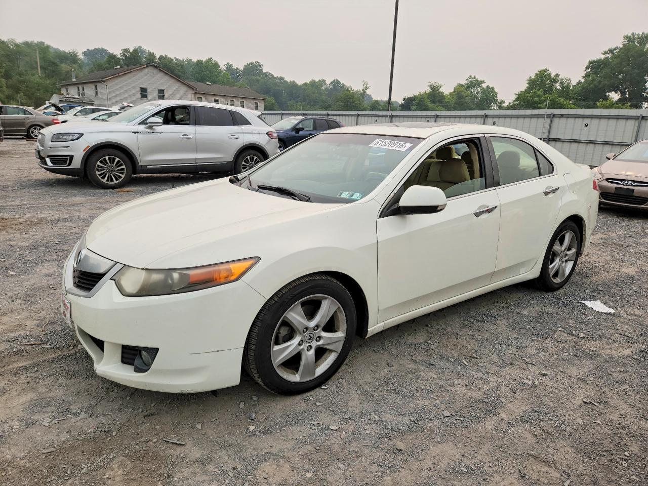 JH4CU2F64AC002163 · 2010 ACURA TSX