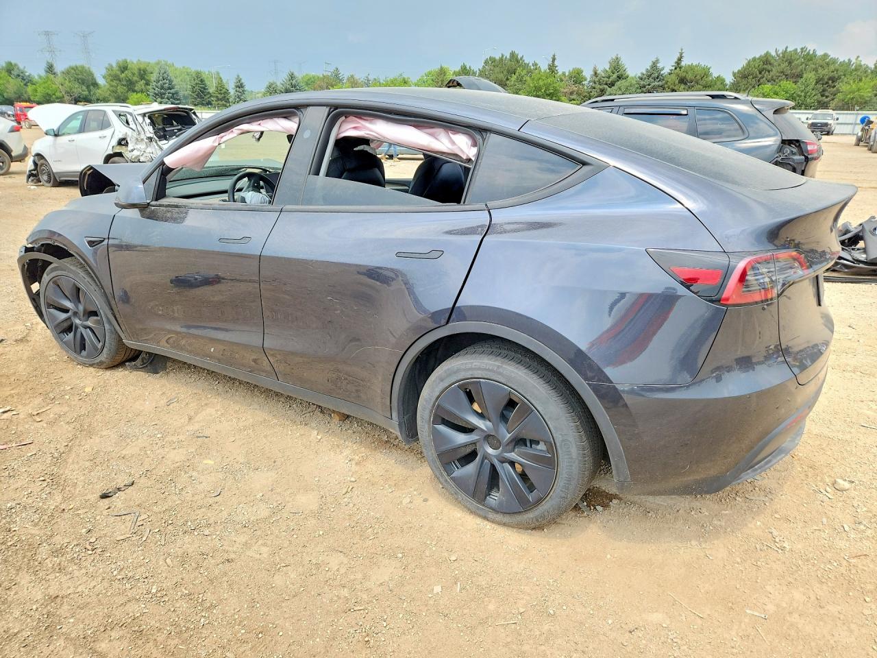 7SAYGDEE1SF216019 · 2025 TESLA MODEL Y · 2/12