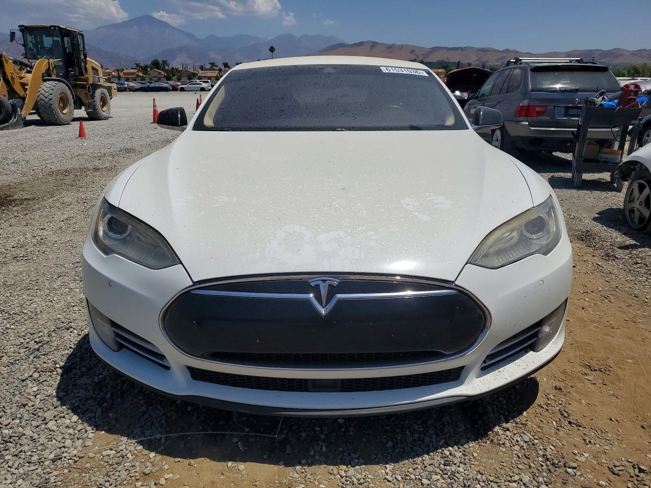 5YJSA1S19EFP57408 · 2014 TESLA MODEL S · 5/12
