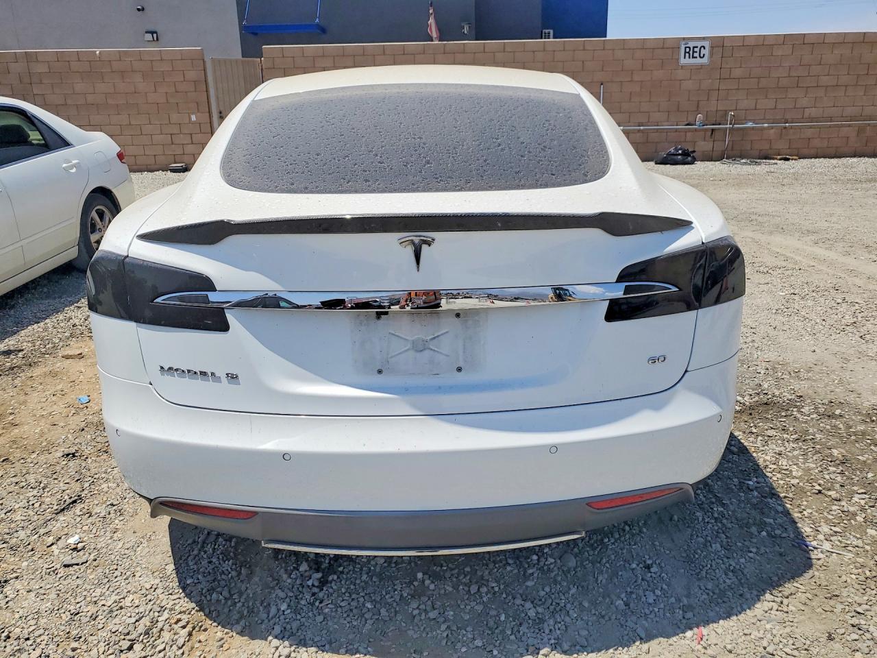 5YJSA1S19EFP57408 · 2014 TESLA MODEL S · 6/12
