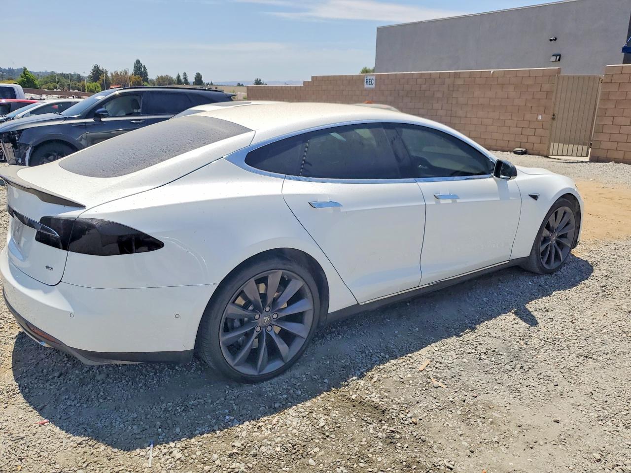 5YJSA1S19EFP57408 · 2014 TESLA MODEL S · 3/12