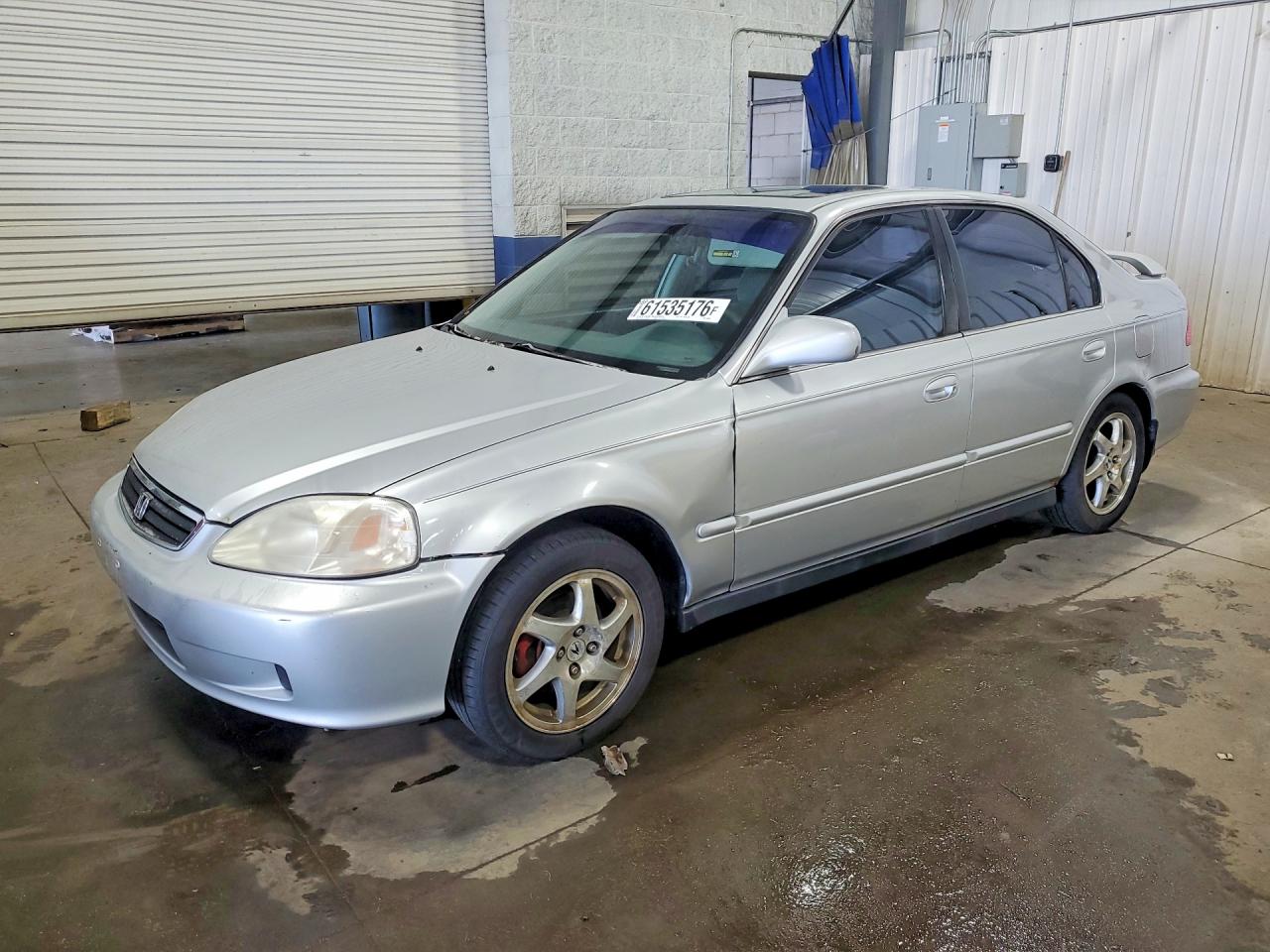 1HGEJ8649XL054340 · 1999 HONDA CIVIC
