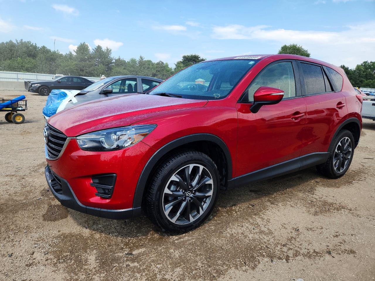 JM3KE4DY8G0723128 · 2016 MAZDA CX-5