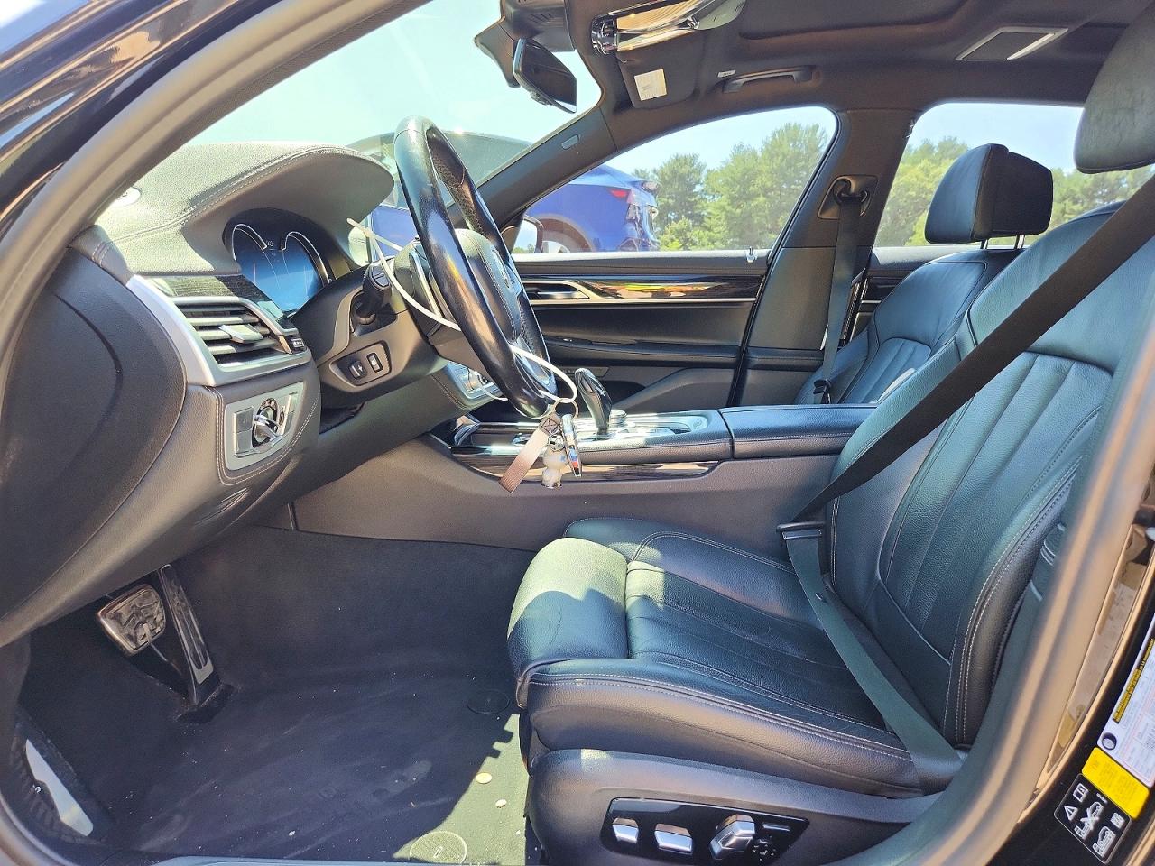 WBA7E4C57KGV70292 · 2019 BMW 740 · 7/12