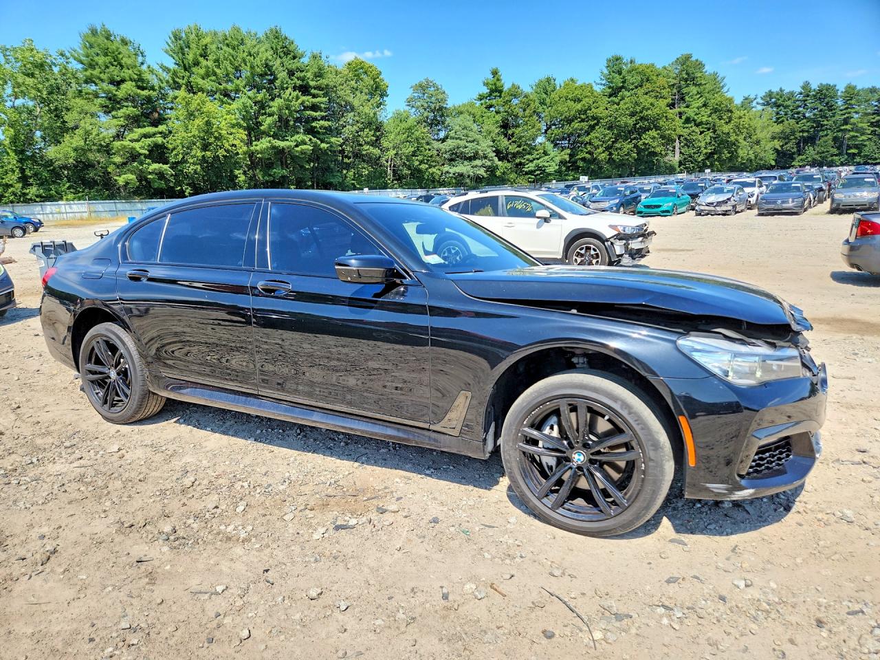 WBA7E4C57KGV70292 · 2019 BMW 740 · 4/12