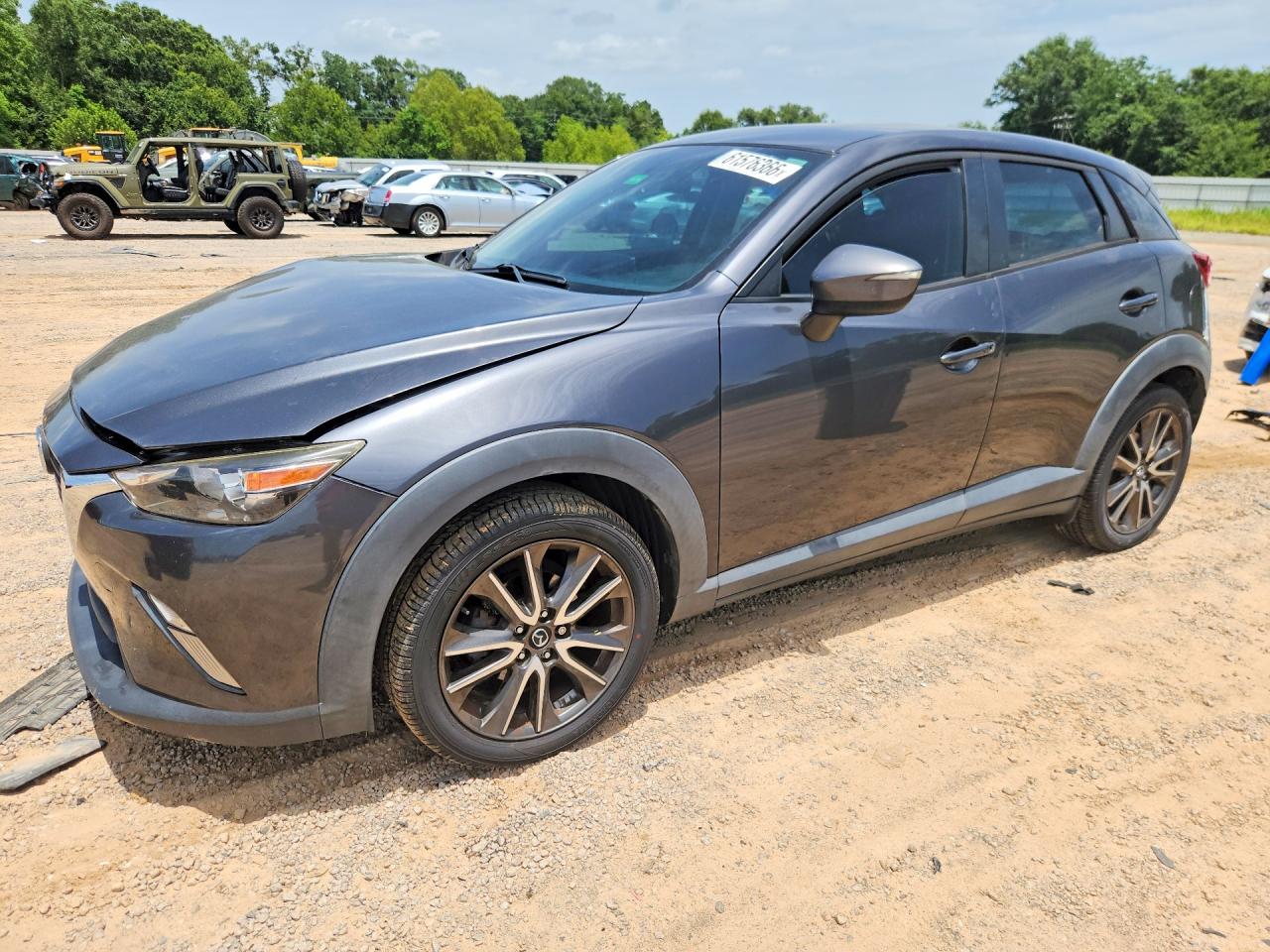 JM1DKDC79H0158411 · 2017 MAZDA CX-3