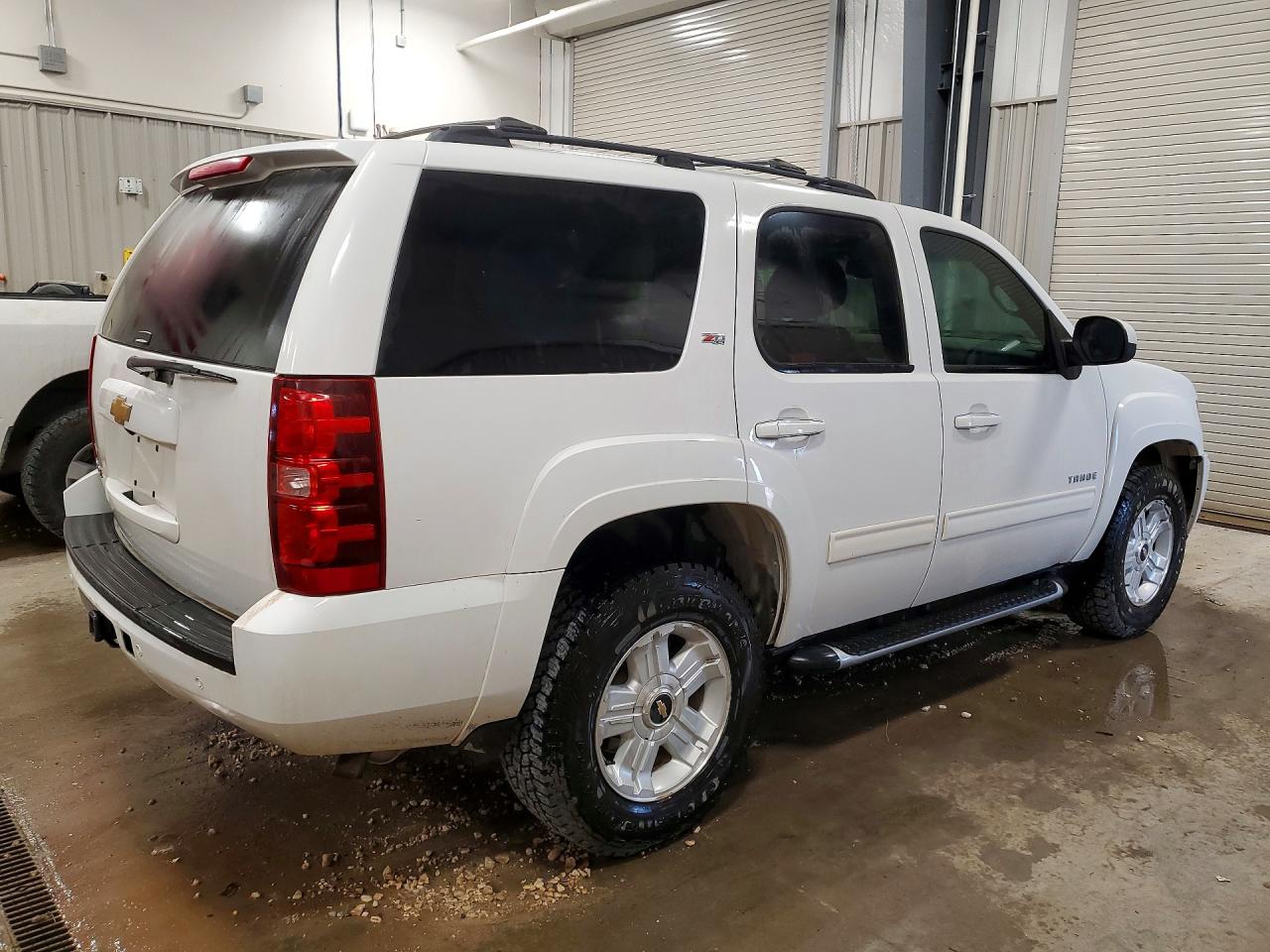 1GNSKBE05DR176672 · 2013 CHEVROLET TAHOE · 3/14