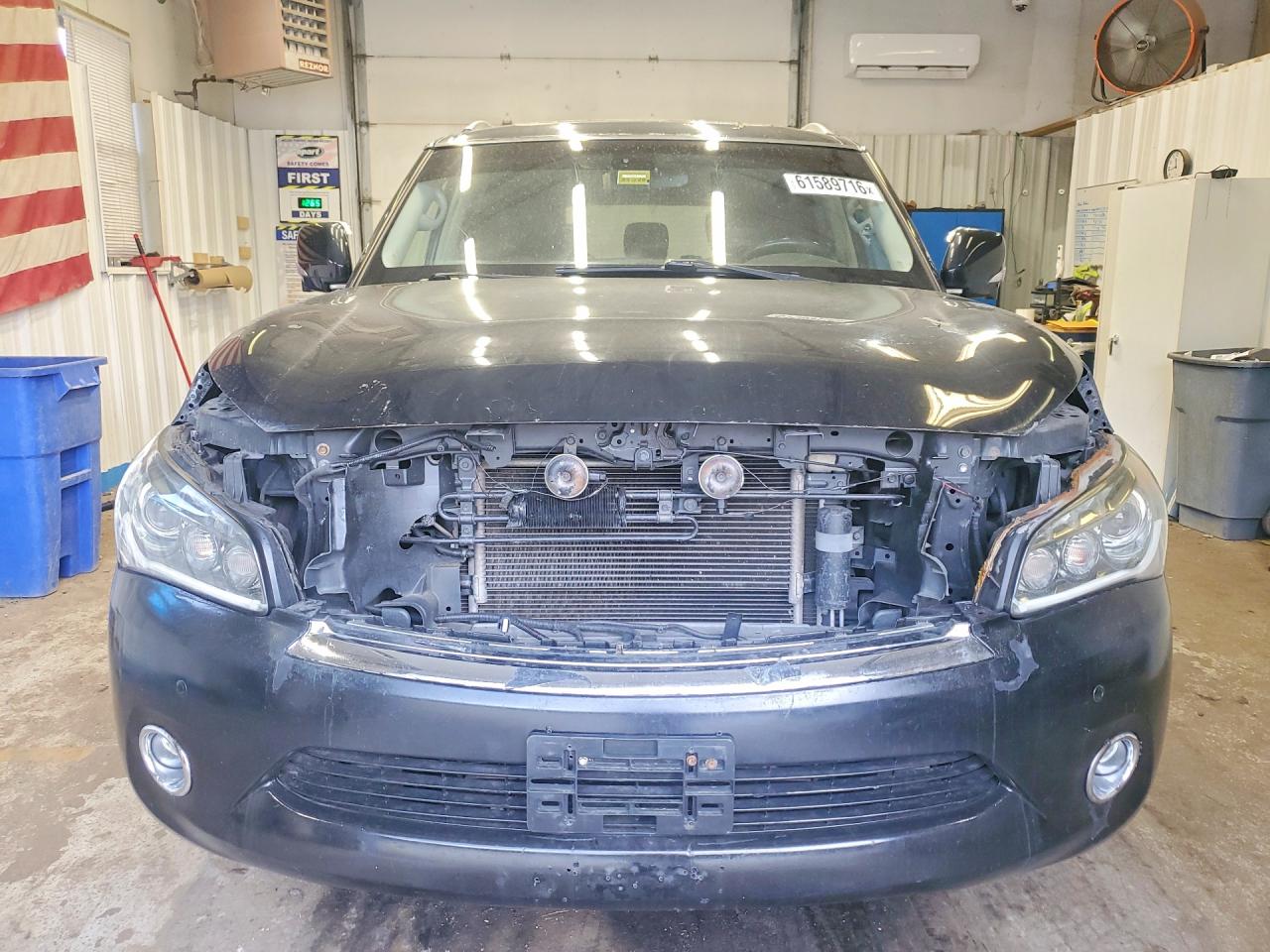 JN8AZ2NC1B9302893 · 2011 INFINITI QX56 · 5/14