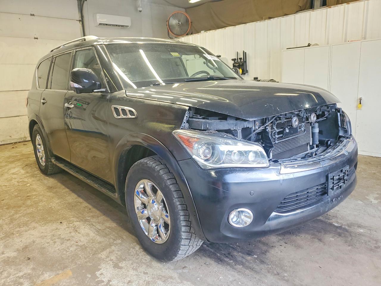 JN8AZ2NC1B9302893 · 2011 INFINITI QX56 · 4/14