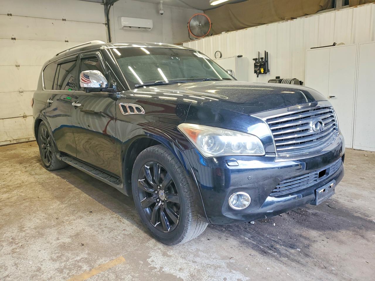 JN8AZ2NC4B9301690 · 2011 INFINITI QX56 · 4/13