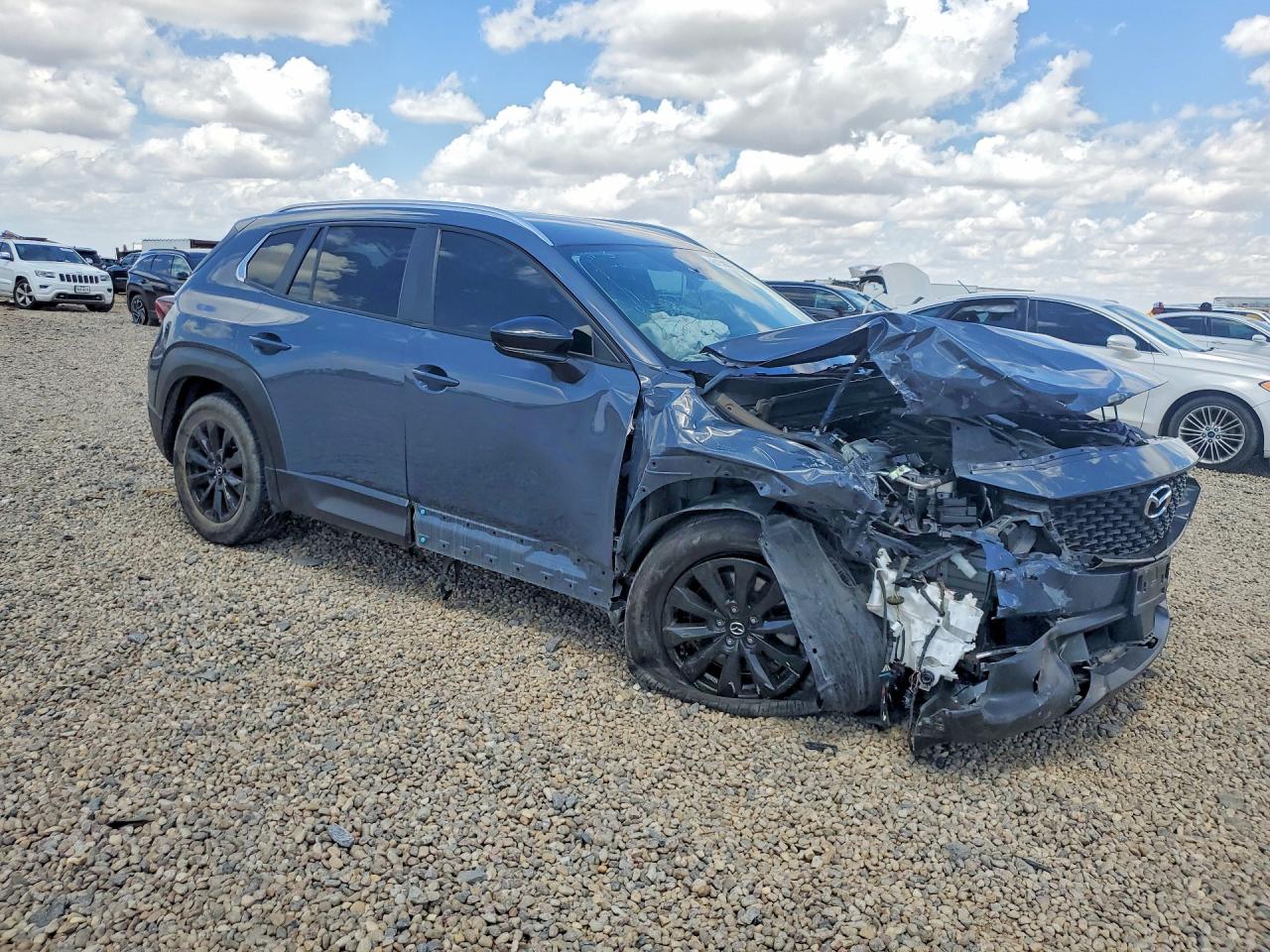 7MMVABAMXRN211206 · 2024 MAZDA CX-50 · 4/14