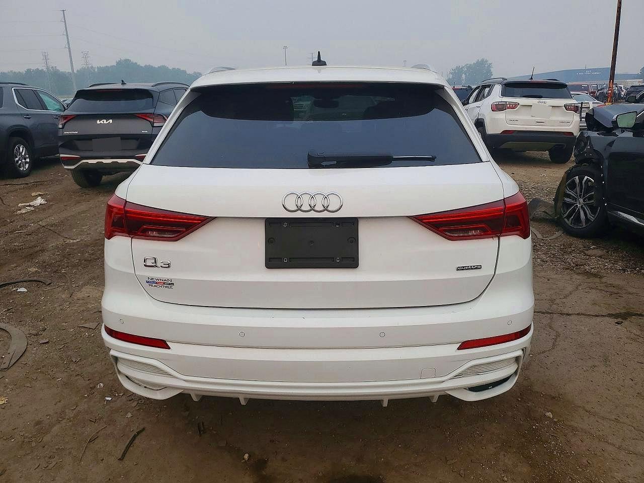 WA1DECF32M1050690 · 2021 AUDI Q3 · 6/13