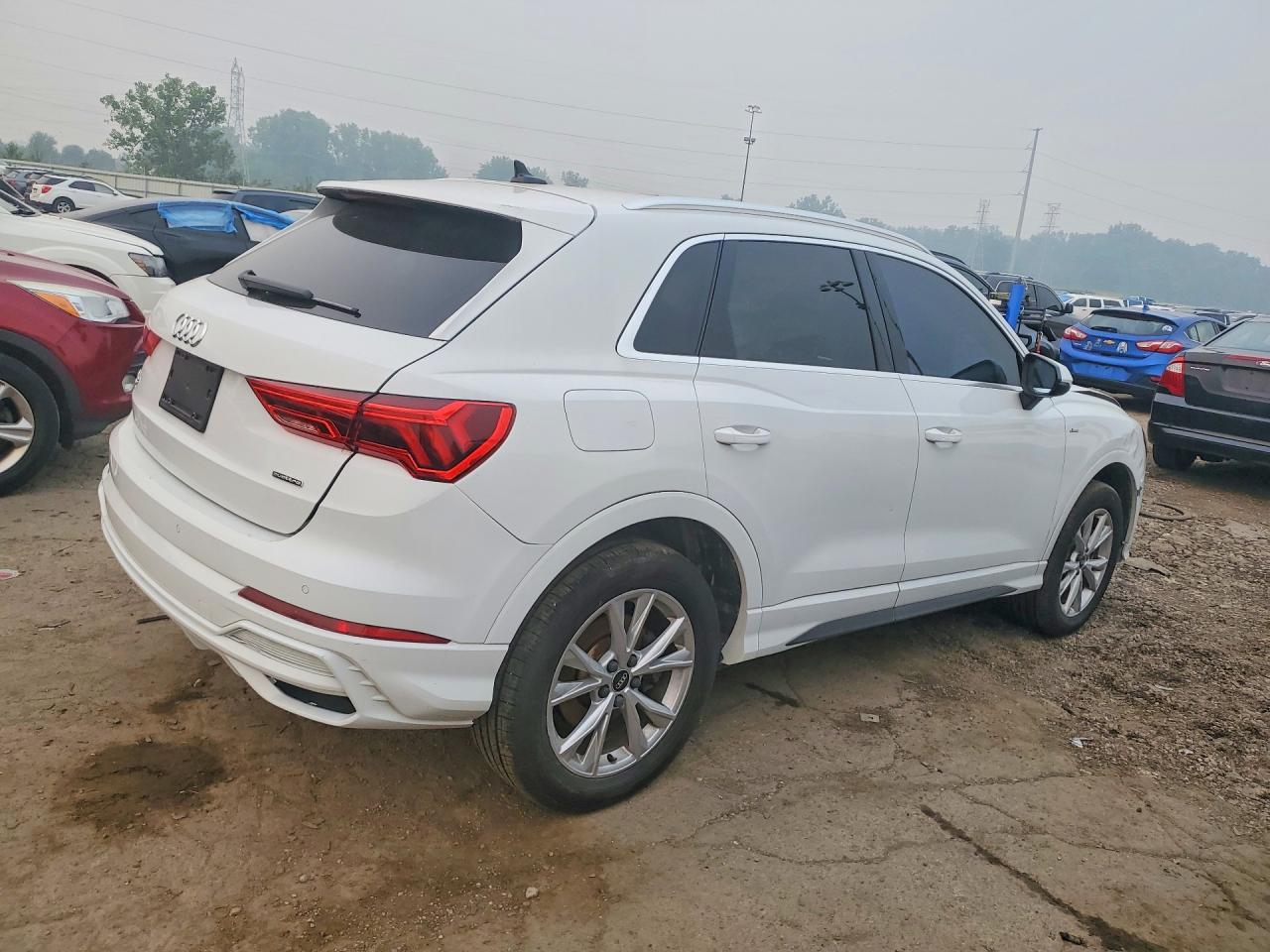WA1DECF32M1050690 · 2021 AUDI Q3 · 3/13
