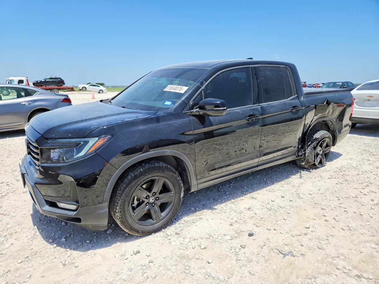 5FPYK3F84PB032299 · 2023 HONDA RIDGELINE