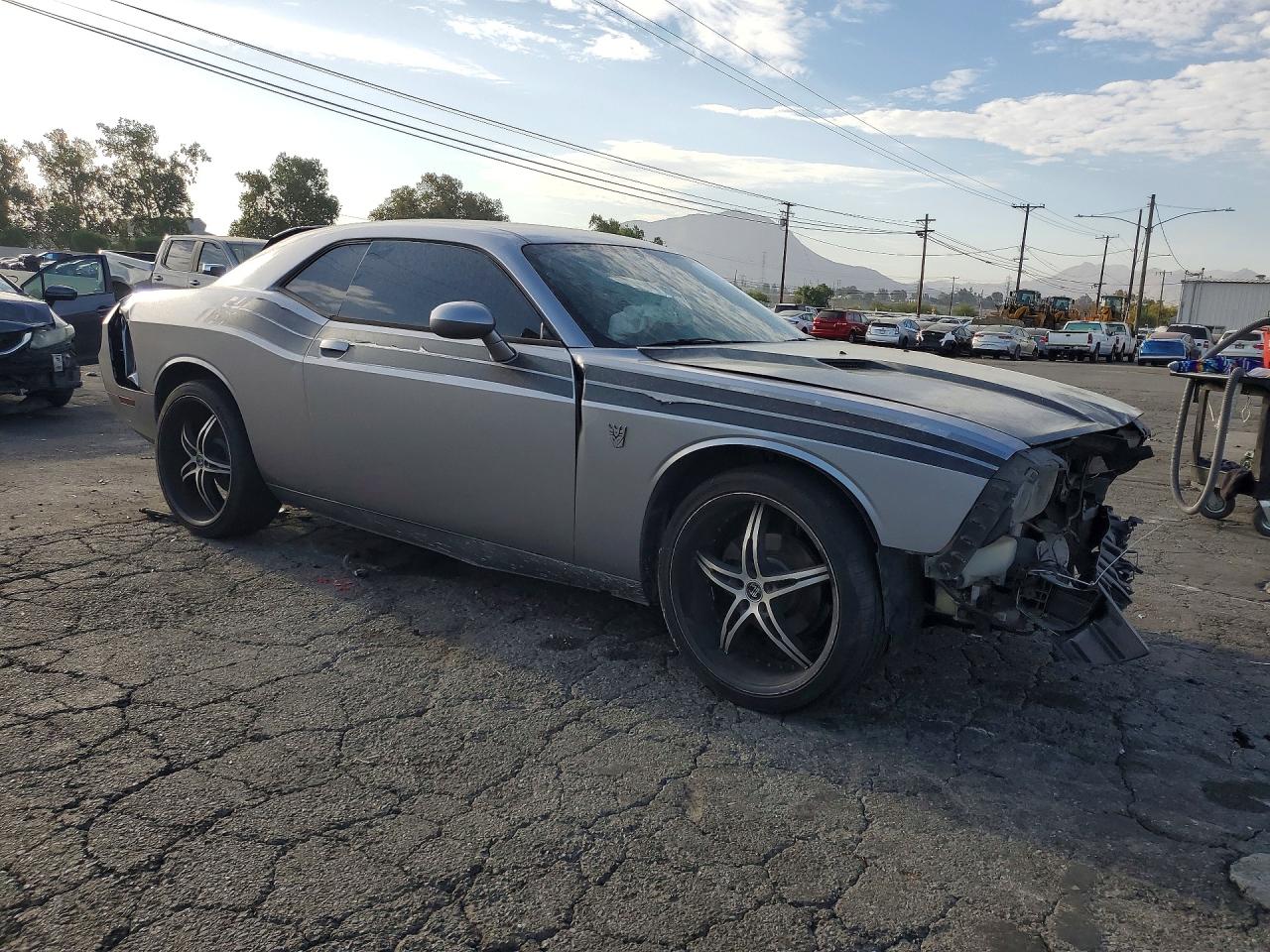 2B3CJ4DG9BH519248 · 2011 DODGE CHALLENGER · 4/12