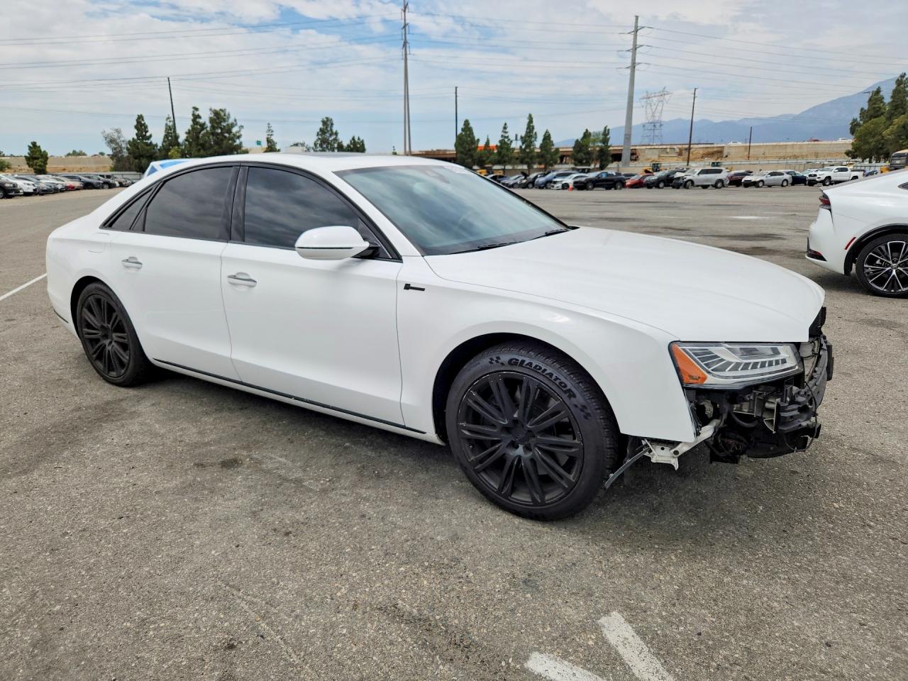 WAUJGAFD3FN037861 · 2015 AUDI A8 · 4/12