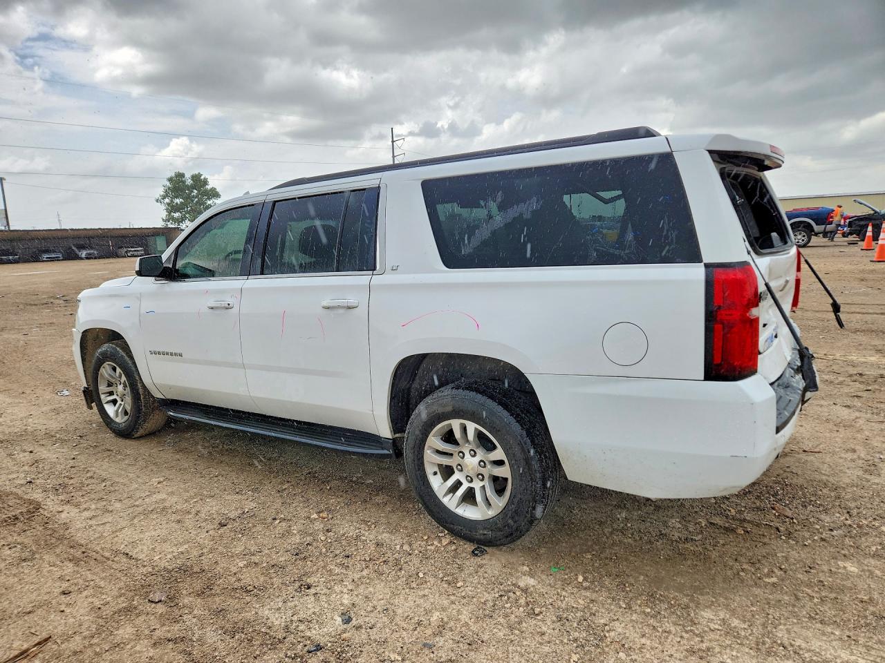1GNSCHKC7KR110166 · 2019 CHEVROLET SUBURBAN · 2/13