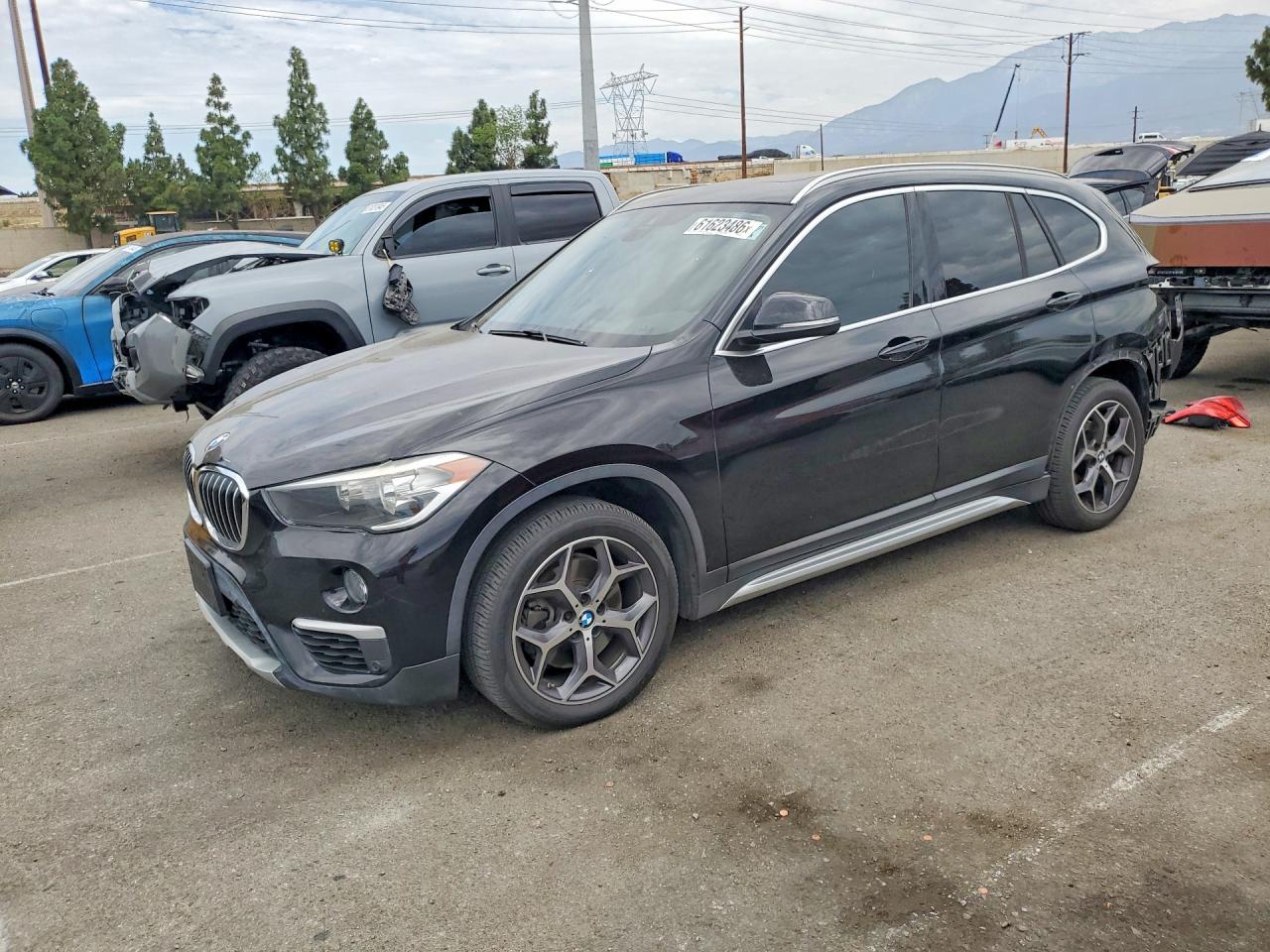 WBXHU7C54K3H46515 · 2019 BMW X1